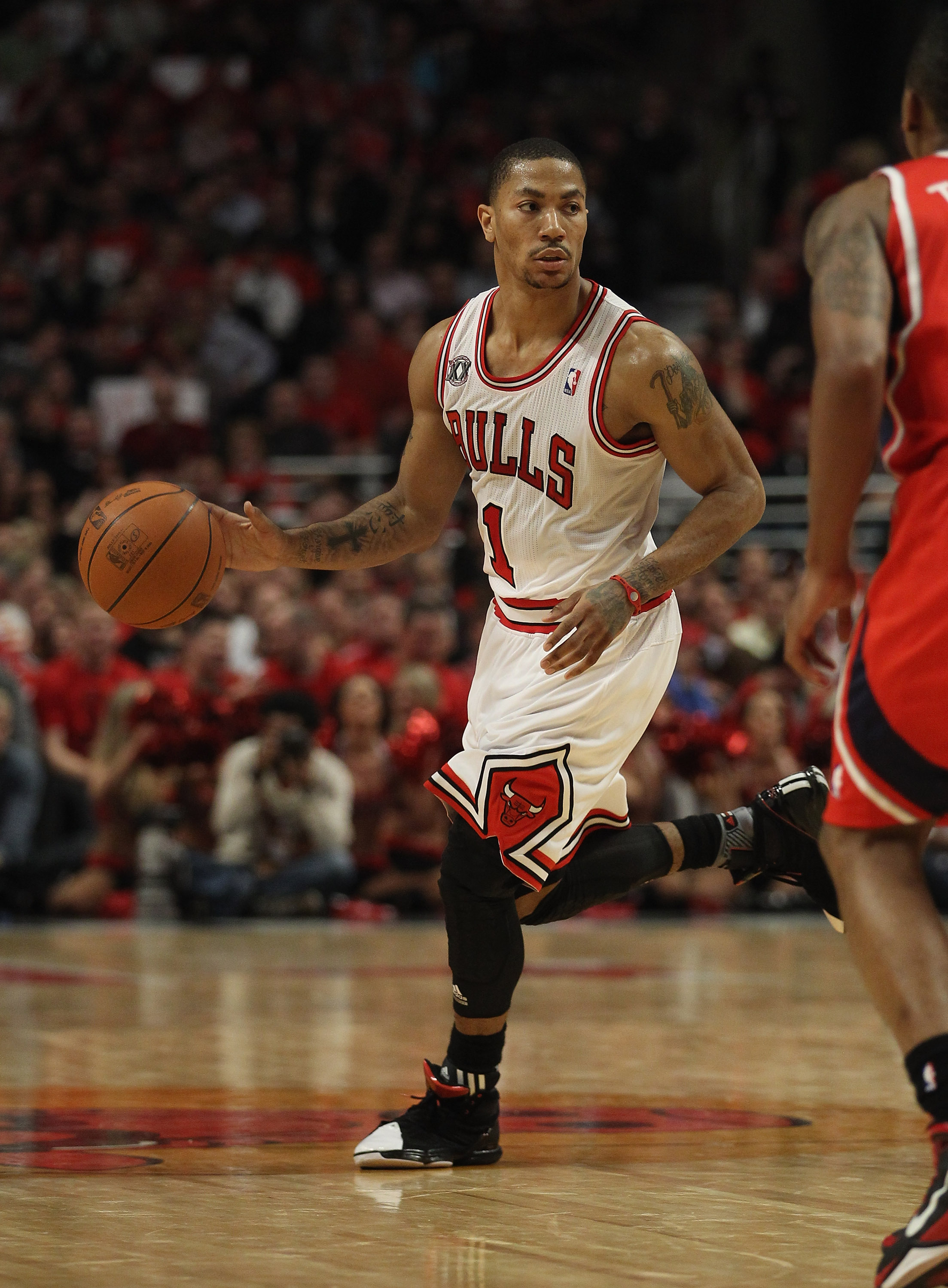 CHICAGO, IL - MAY 04: Derrick Rose #1 of the Chicago Bulls moves with the ball against the Atlanta Hawks in Game Two of the Eastern Conference Semifinals in the 2011 NBA Playoffs at the United Center on May 4, 2011 in Chicago, Illinois. The Bulls defeated