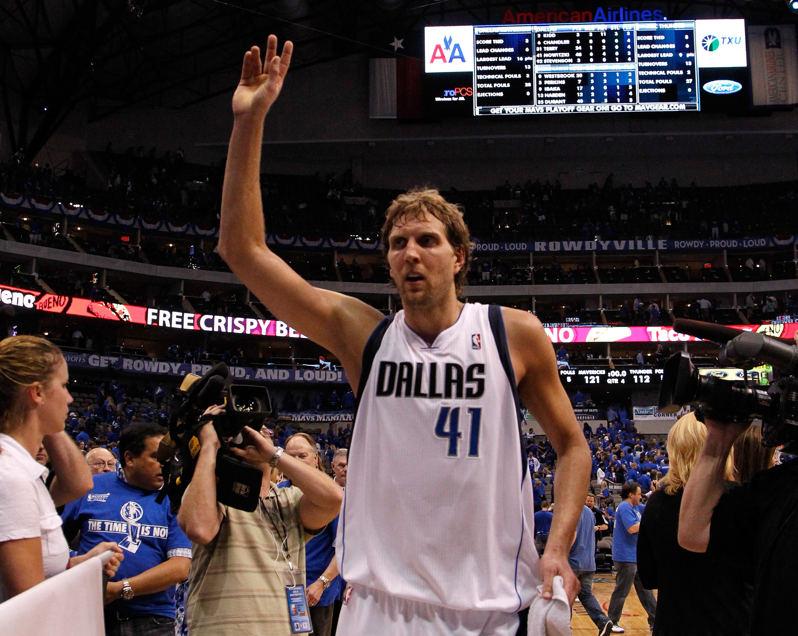 DALLAS, TX - MAY 17:  Dirk Nowitzki #41 of the Dallas Mavericks celebrates as he walks off the court after the Mavericks defeated the Oklahoma City Thunder 121-112 in Game One of the Western Conference Finals during the 2011 NBA Playoffs at American Airli