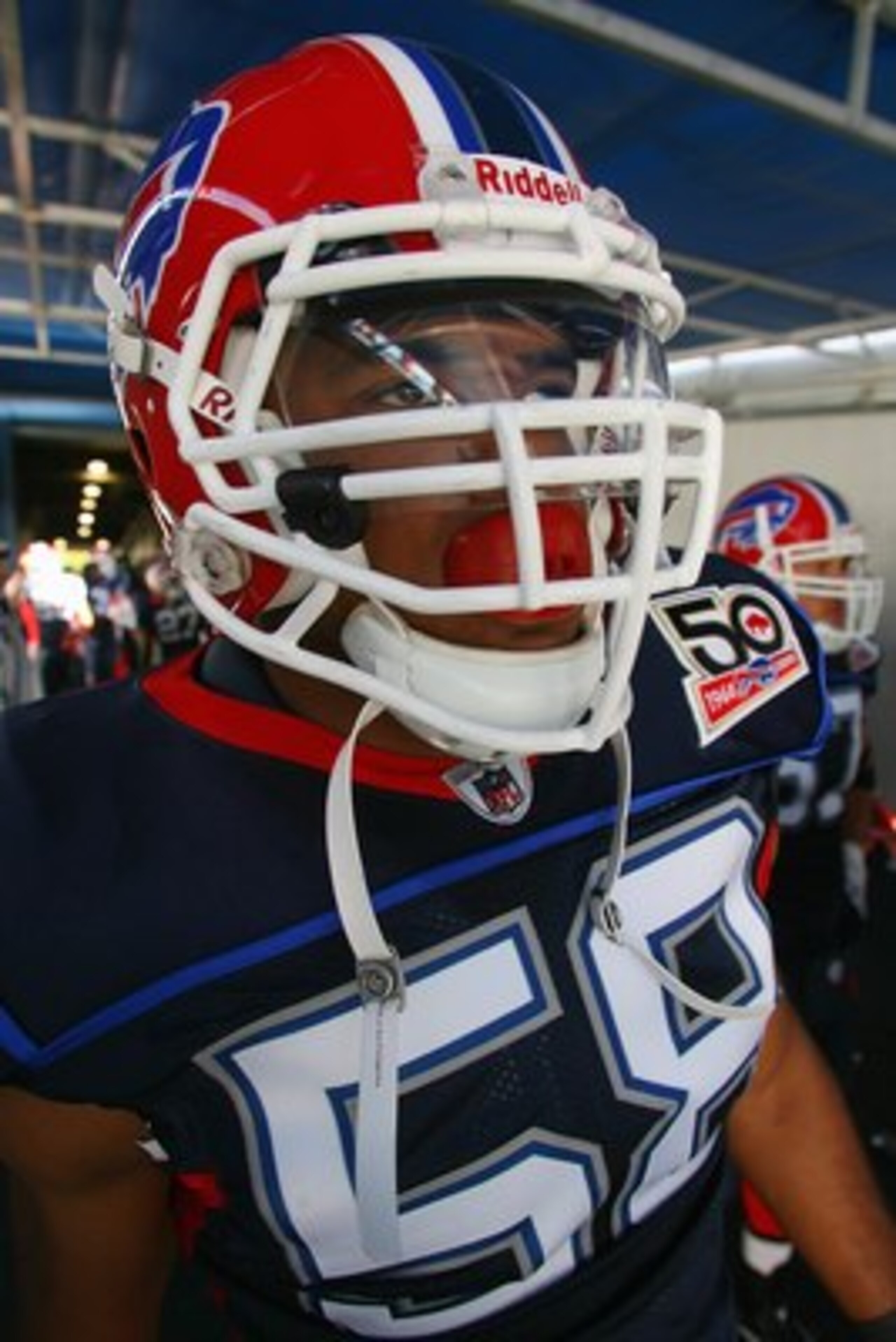 ORCHARD PARK, NY - SEPTEMBER 20:  Defensive end Aaron Maybin #58 of the Buffalo Bills gets ready to take the field prior to the game against the Tampa Bay Buccaneers at Ralph Wilson Stadium on September 20, 2009 in Orchard Park, New York.  The Bills won 3