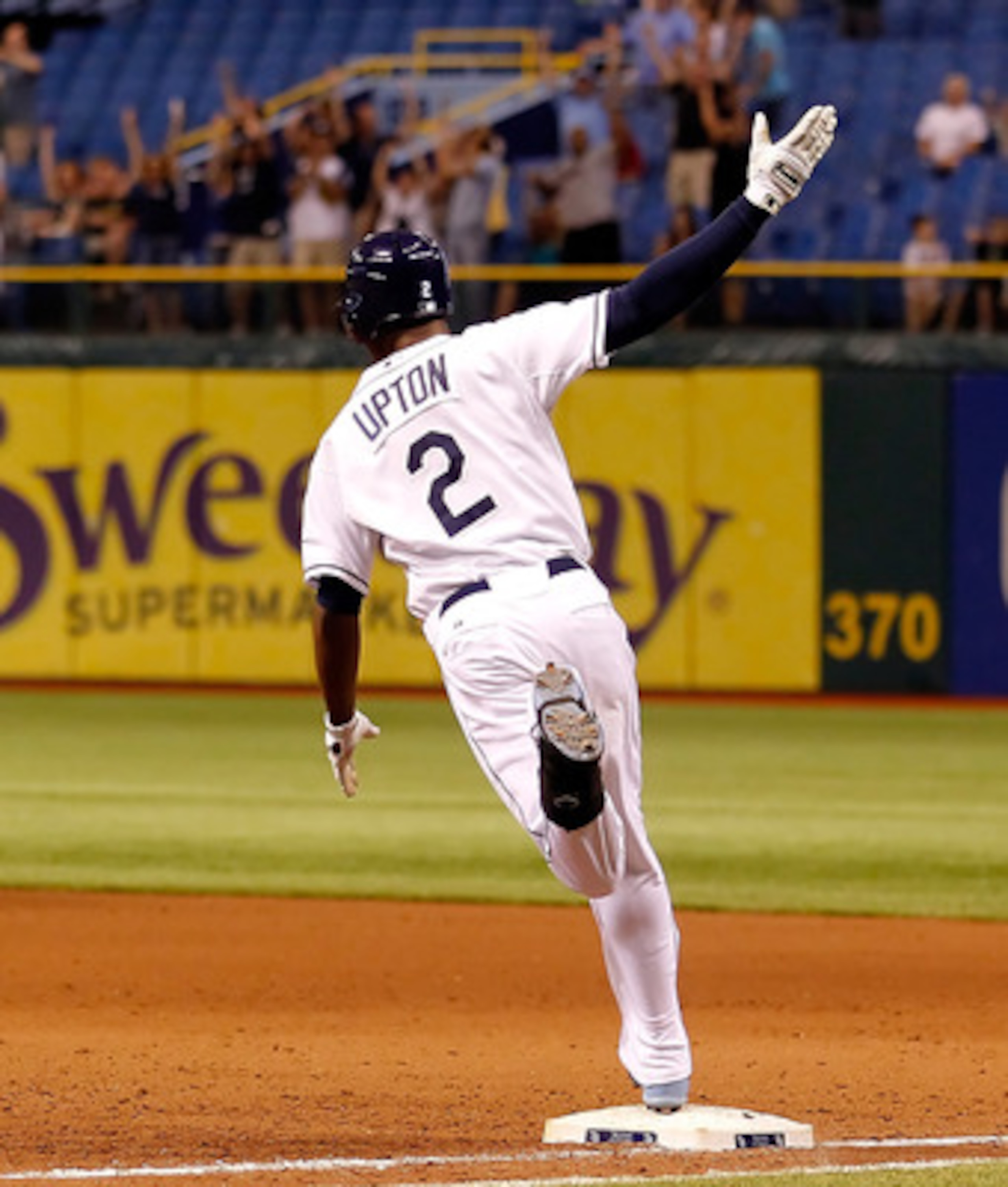 ST. PETERSBURG, FL - MAY 03:  Outfielder B.J. Upton #2 of the Tampa Bay Rays celebrates his two run walkoff home run against the Toronto Blue Jays at Tropicana Field on May 3, 2011 in St. Petersburg, Florida.  (Photo by J. Meric/Getty Images)