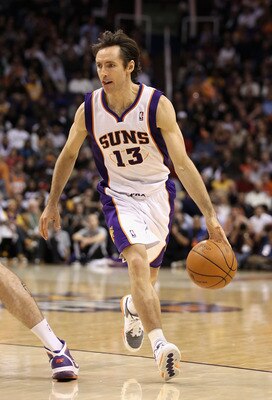 PHOENIX, AZ - JANUARY 05:  Steve Nash #13 of the Phoenix Suns handles the ball during the NBA game against the Los Angeles Lakers at US Airways Center on January 5, 2011 in Phoenix, Arizona. The Lakers defeated the Suns 99-95.  NOTE TO USER: User expressl