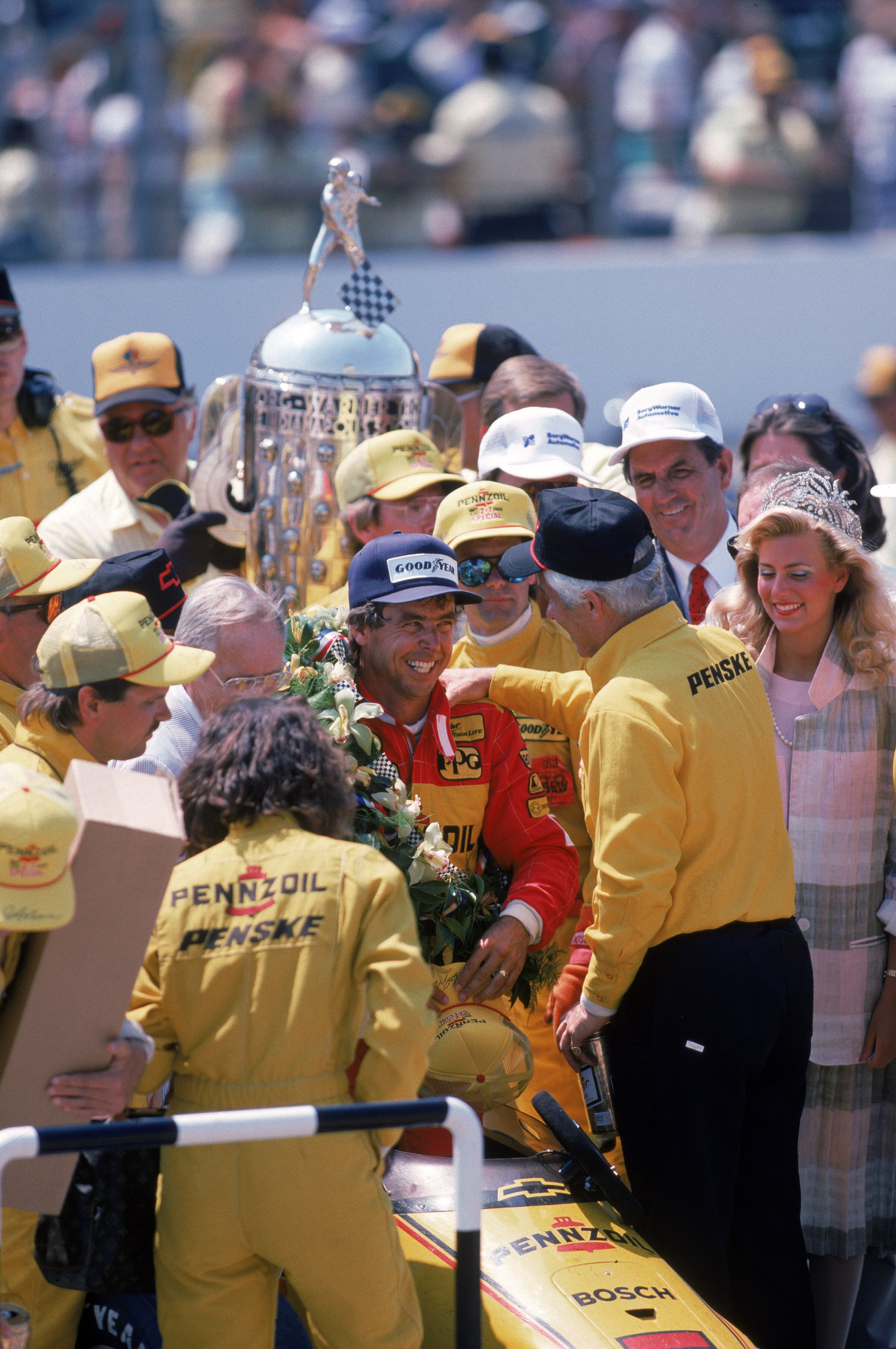 INDIANAPOLIS - 1988:  Driver Rick Mears celebrates his win with Owner Roger Penske after the Indy 500 in 1988 in Indianapols, Indiana. (Photo by Getty Images/Getty Images)
