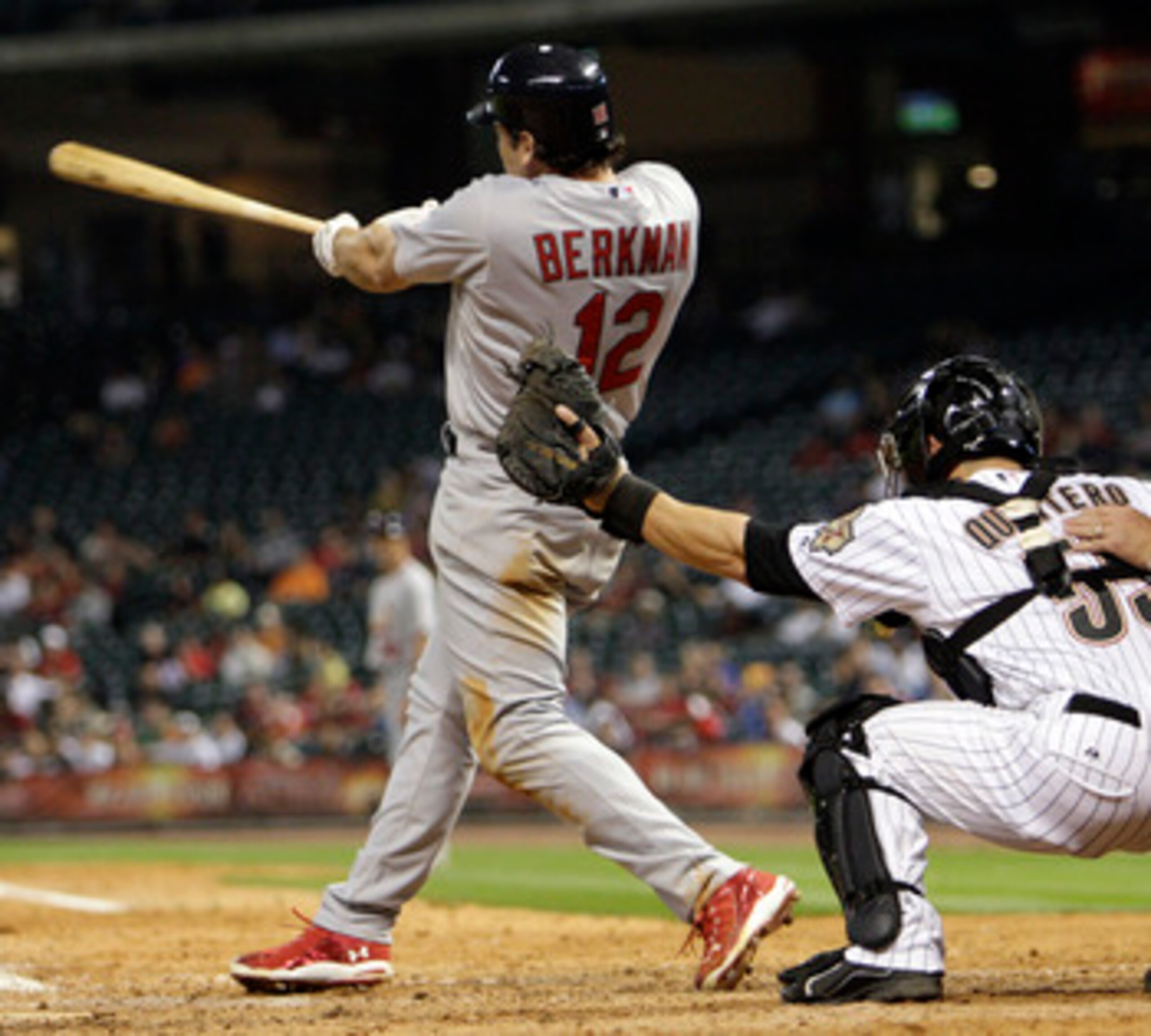 HOUSTON - APRIL 26:  Lance Berkman #12 of the St. Louis Cardinals doubles to center field in the ninth scoring Matt Holliday with the go ahead run at Minute Maid Park on April 26, 2011 in Houston, Texas. Houston won 6-5. (Photo by Bob Levey/Getty Images)