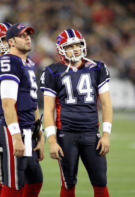TORONTO - DECEMBER 3:  Quarterback Ryan Fitzpatrick #14 of the Buffalo Bills looks on during a break in game action during their NFL game against the New York Jets on December 3, 2009  at Rogers Centre in Toronto, Ontario, Canada. The Jets defeated the Bi