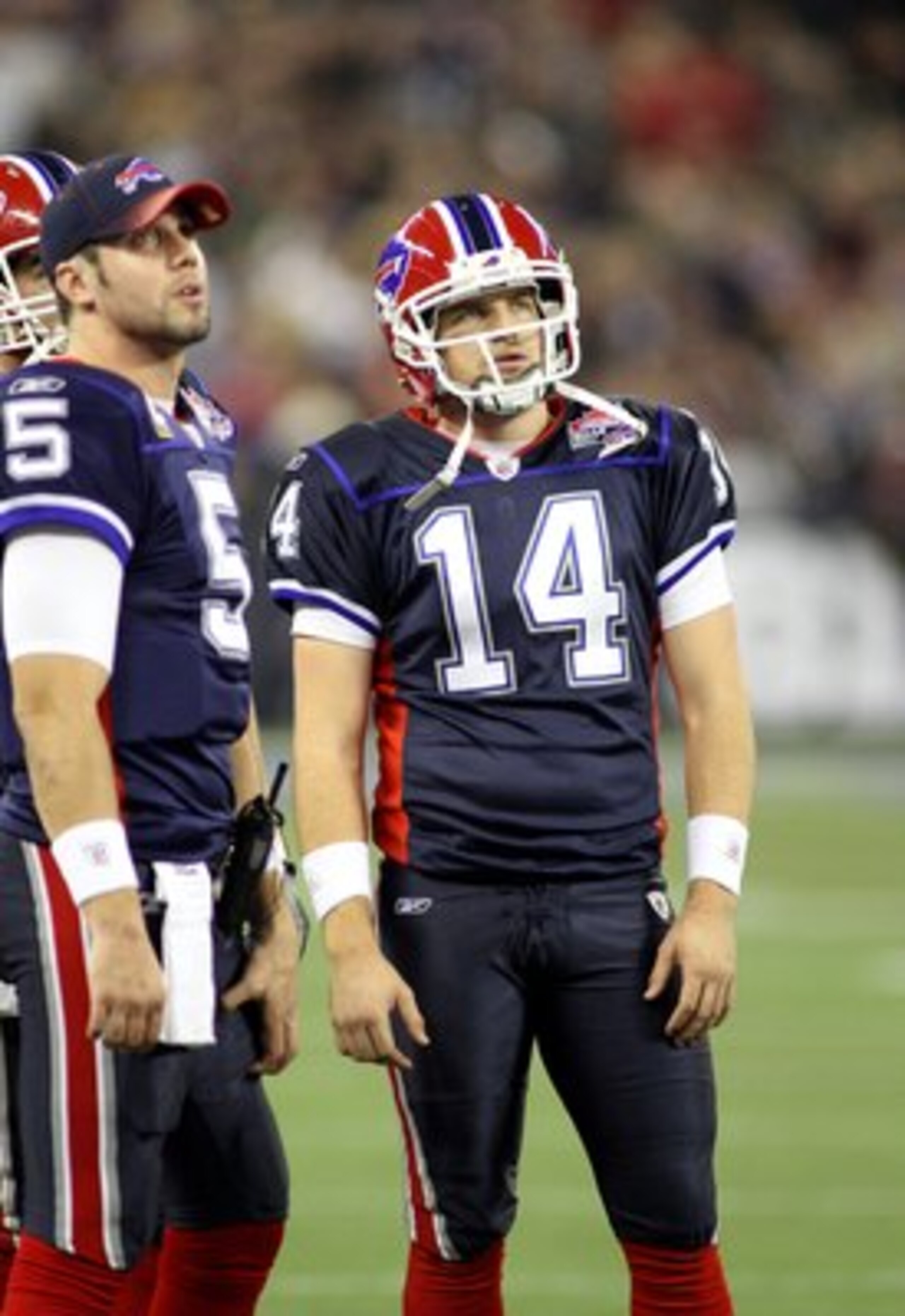 TORONTO - DECEMBER 3:  Quarterback Ryan Fitzpatrick #14 of the Buffalo Bills looks on during a break in game action during their NFL game against the New York Jets on December 3, 2009  at Rogers Centre in Toronto, Ontario, Canada. The Jets defeated the Bi