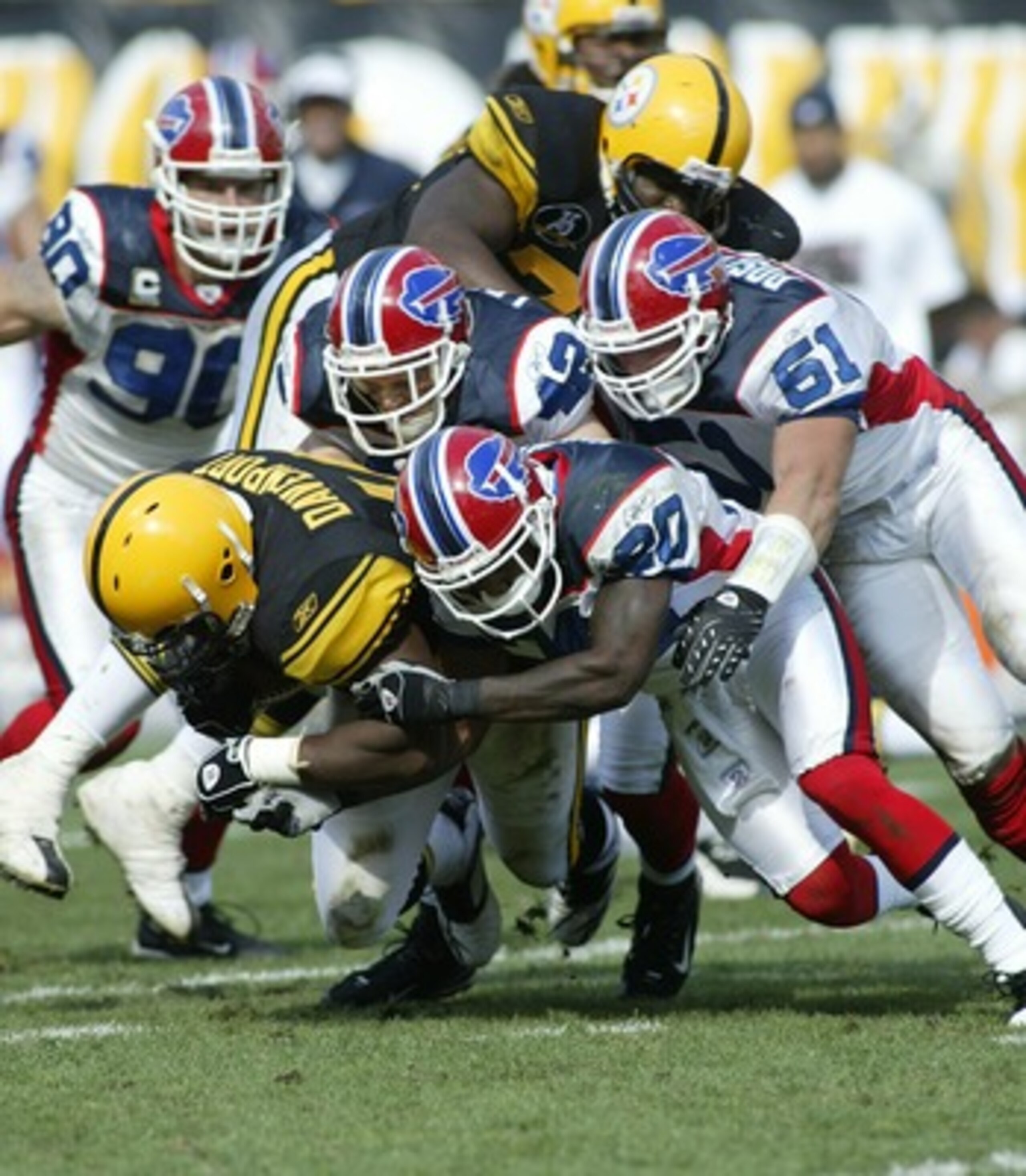 PITTSBURGH - SEPTEMBER 16:  Najeh Davenport #44 of the Pittsburgh Steelers is tackled by Donte Whitner #20, Paul Posluszny #51 and Jim Leonard #42 of the Buffalo Bills at Heinz Field September 16, 2007 in Pittsburgh, Pennsylvania. Pittsburgh won 26-3.  (P