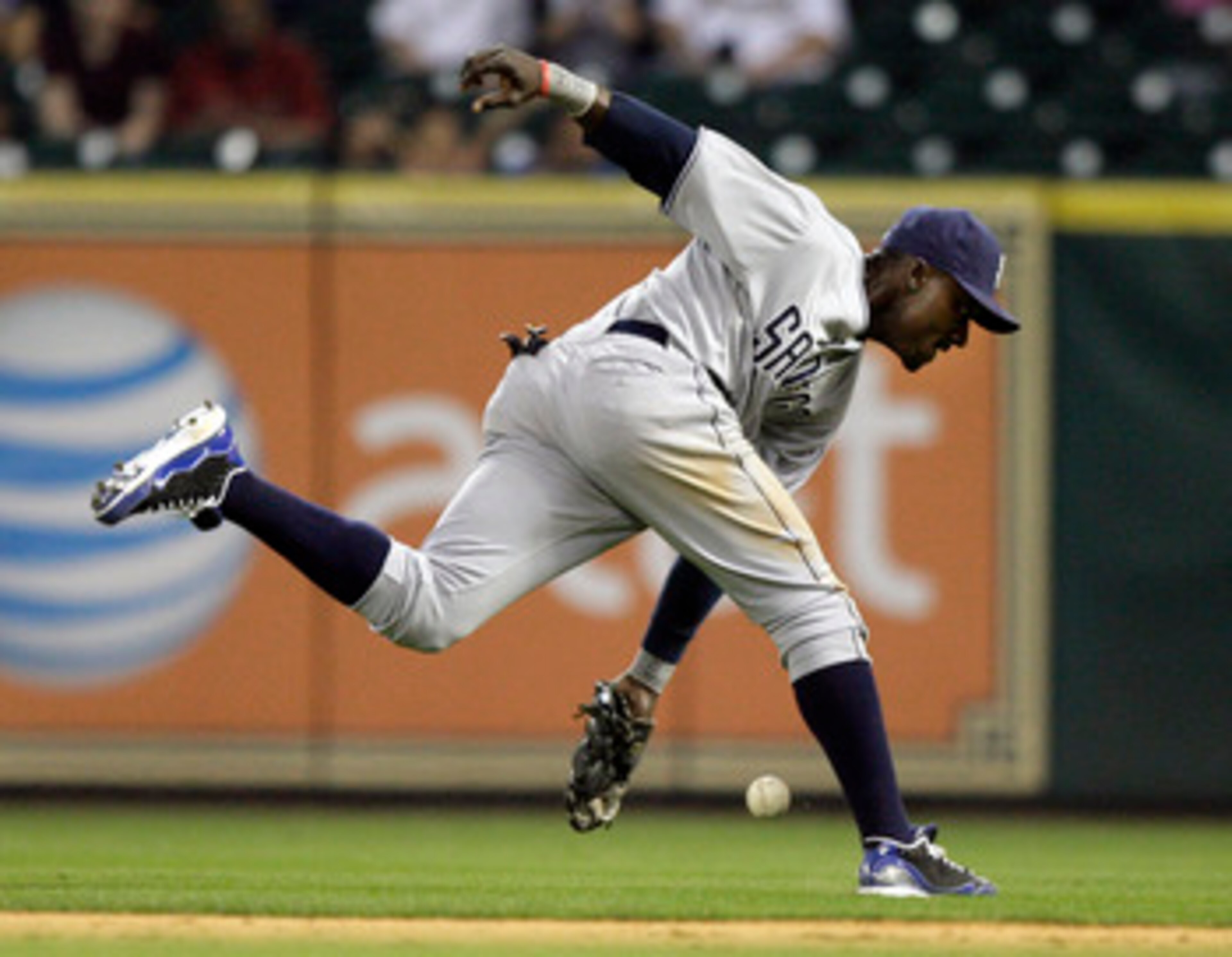 HOUSTON - APRIL 15:  Second baseman Orlando Hudson #1 of the San Diego Padres can't reach this ground ball hit by Carlos Lee #45 of the Houston Astros in the ninth inning at Minute Maid Park on April 15, 2011 in Houston, Texas.  (Photo by Bob Levey/Getty