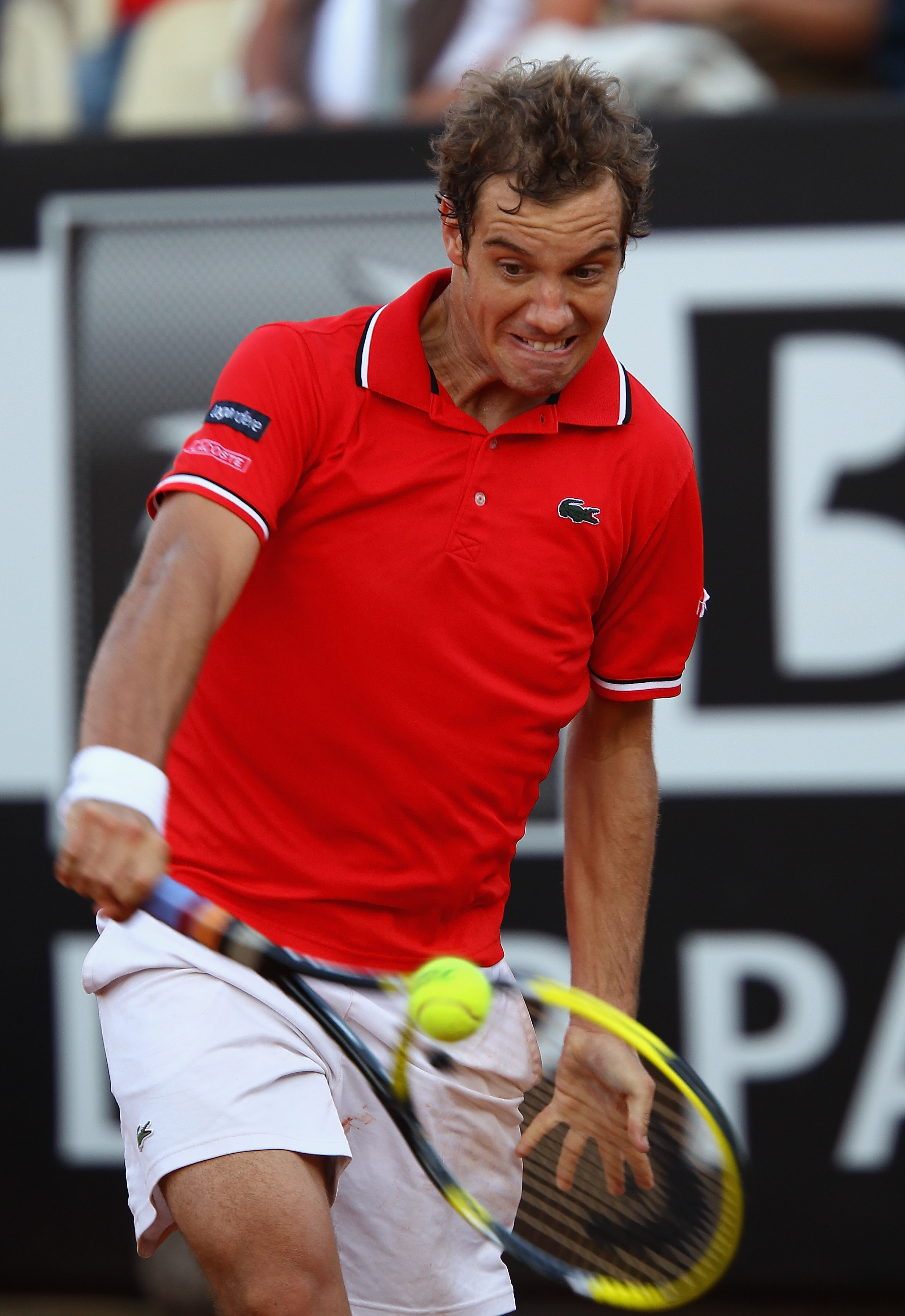 ROME, ITALY - MAY 13:  Richard Gasquet of France plays a backhand during his quarter final match against Tomas Berdych of Czech Republic during day six of the Internazoinali BNL D'Italia at the Foro Italico Tennis Centre  on May 13, 2011 in Rome, Italy.