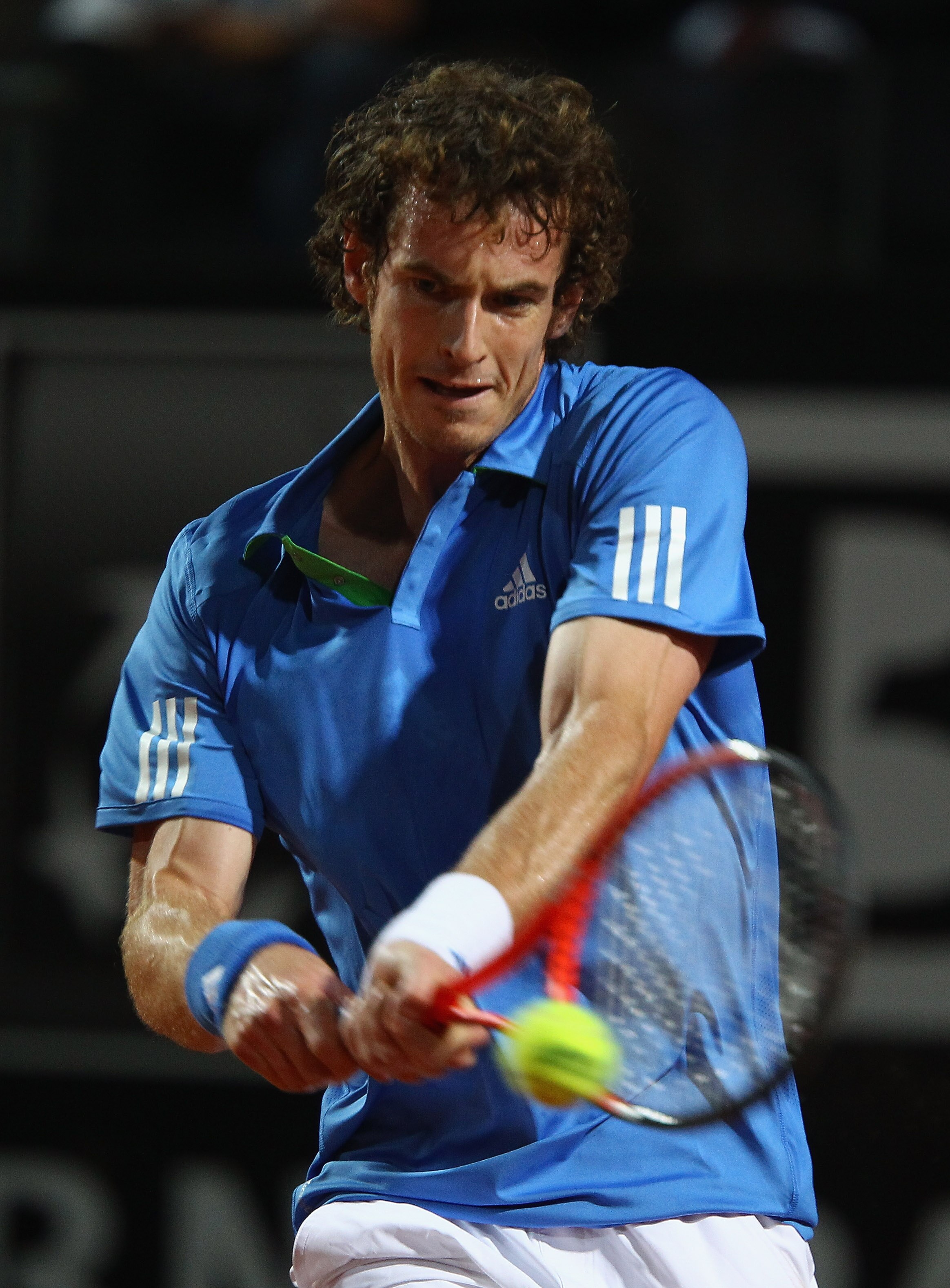 ROME, ITALY - MAY 10: Andy Murray of Great Britain plays a back hand during his second round match against Xavier Malisse of Belgium during day three of the Internazoinali BNL D'Italia at the Foro Italico Tennis Centre on May 10, 2011 in Rome, Italy.  (Ph