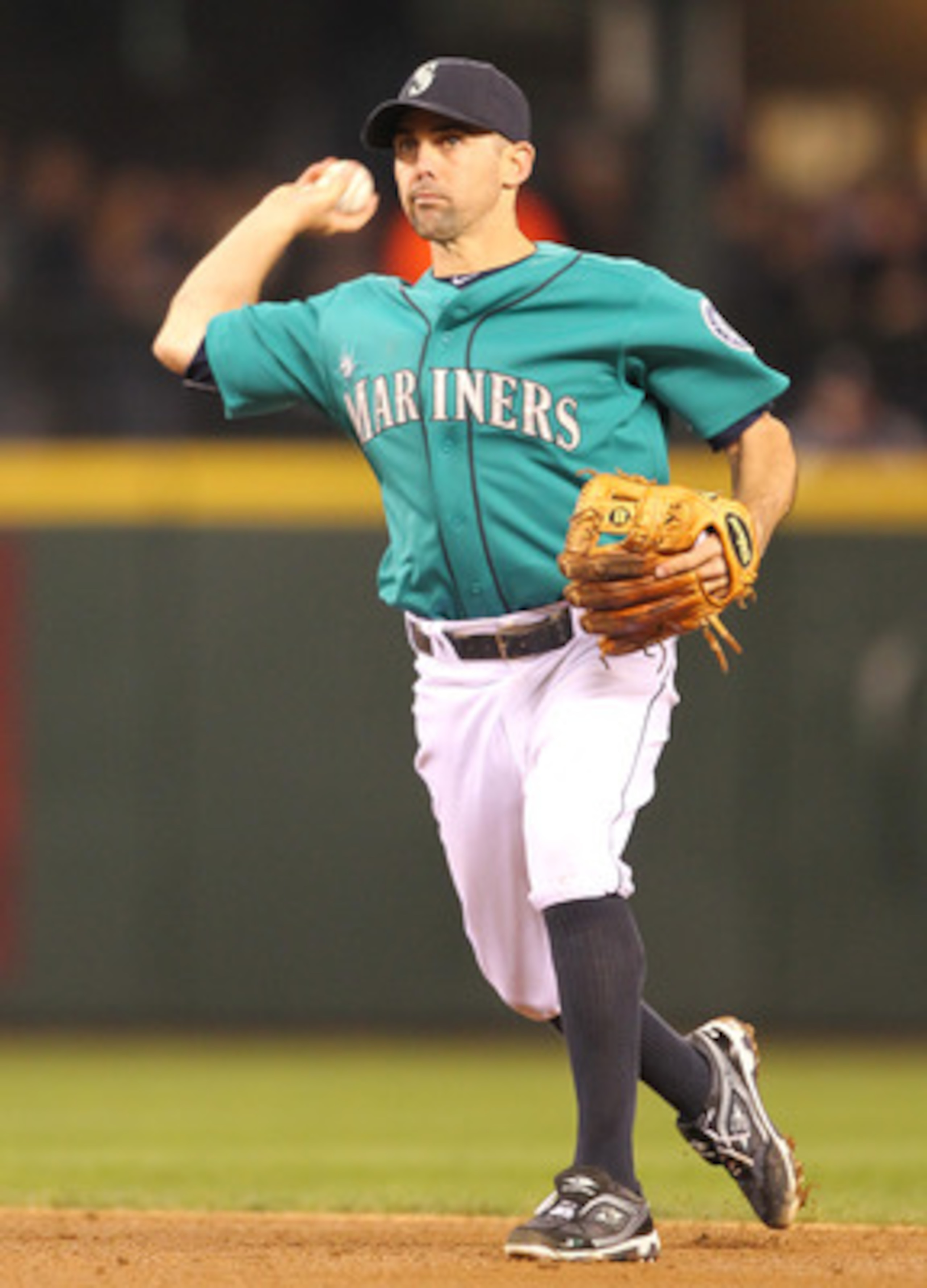 SEATTLE - MAY 06:  Jack Wilson #2 of the Seattle Mariners throws to first against the Chicago White Sox at Safeco Field on May 6, 2011 in Seattle, Washington. The Mariners won 3-2. (Photo by Otto Greule Jr/Getty Images)