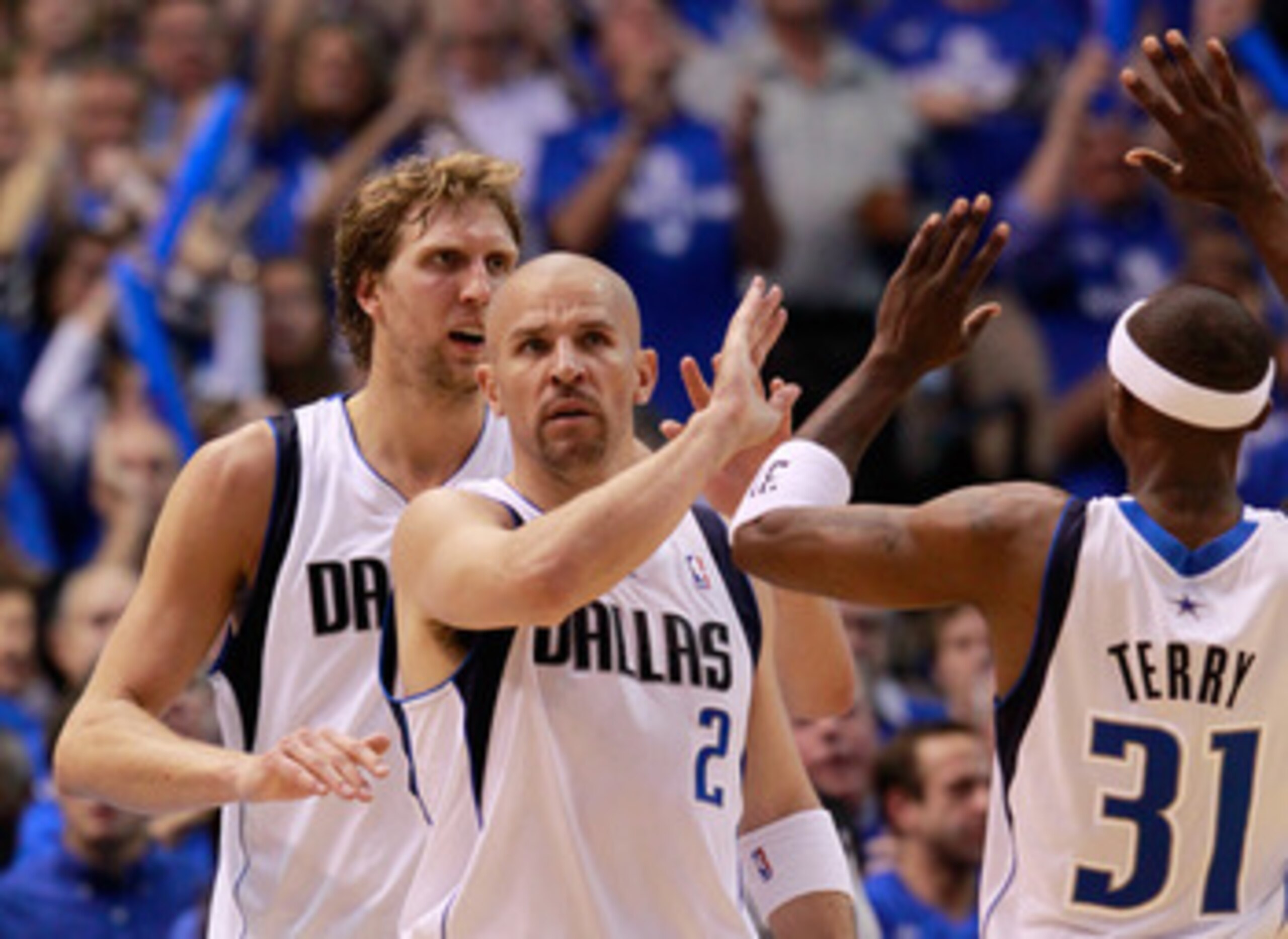 DALLAS, TX - MAY 17:  Jason Kidd #2 of the Dallas Mavericks reacts with teammates Dirk Nowitzki #41 and Jason Terry #31 in the first half while taking on the Oklahoma City Thunder in Game One of the Western Conference Finals during the 2011 NBA Playoffs a