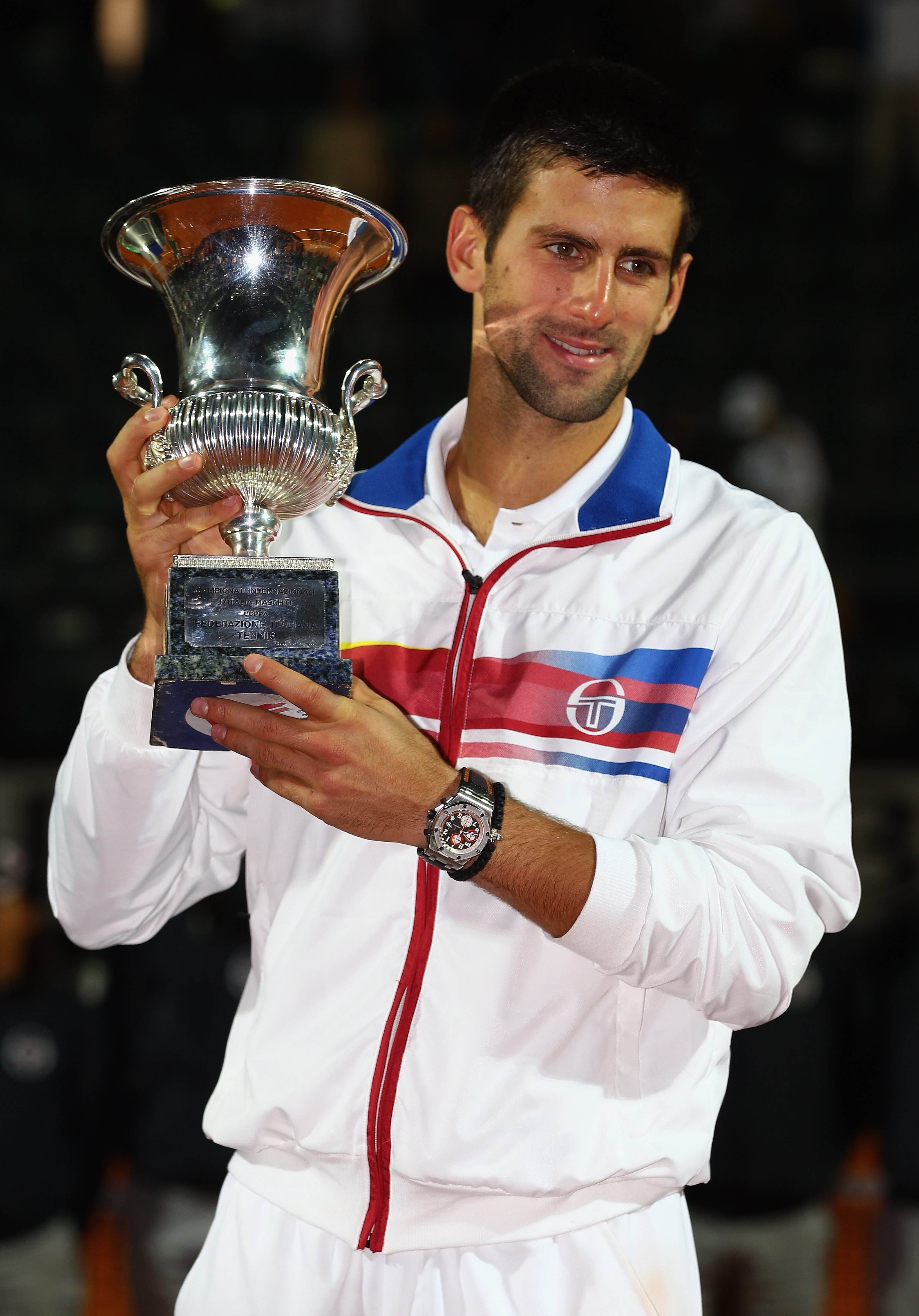ROME, ITALY - MAY 15:  Novak Djokovic of Serbia holds the trophy aloft after his victory in the final against Rafael Nadal of Spain during day eight of the Internazoinali BNL D'Italia at the Foro Italico Tennis Centre on May 15, 2011 in Rome, Italy.  (Pho