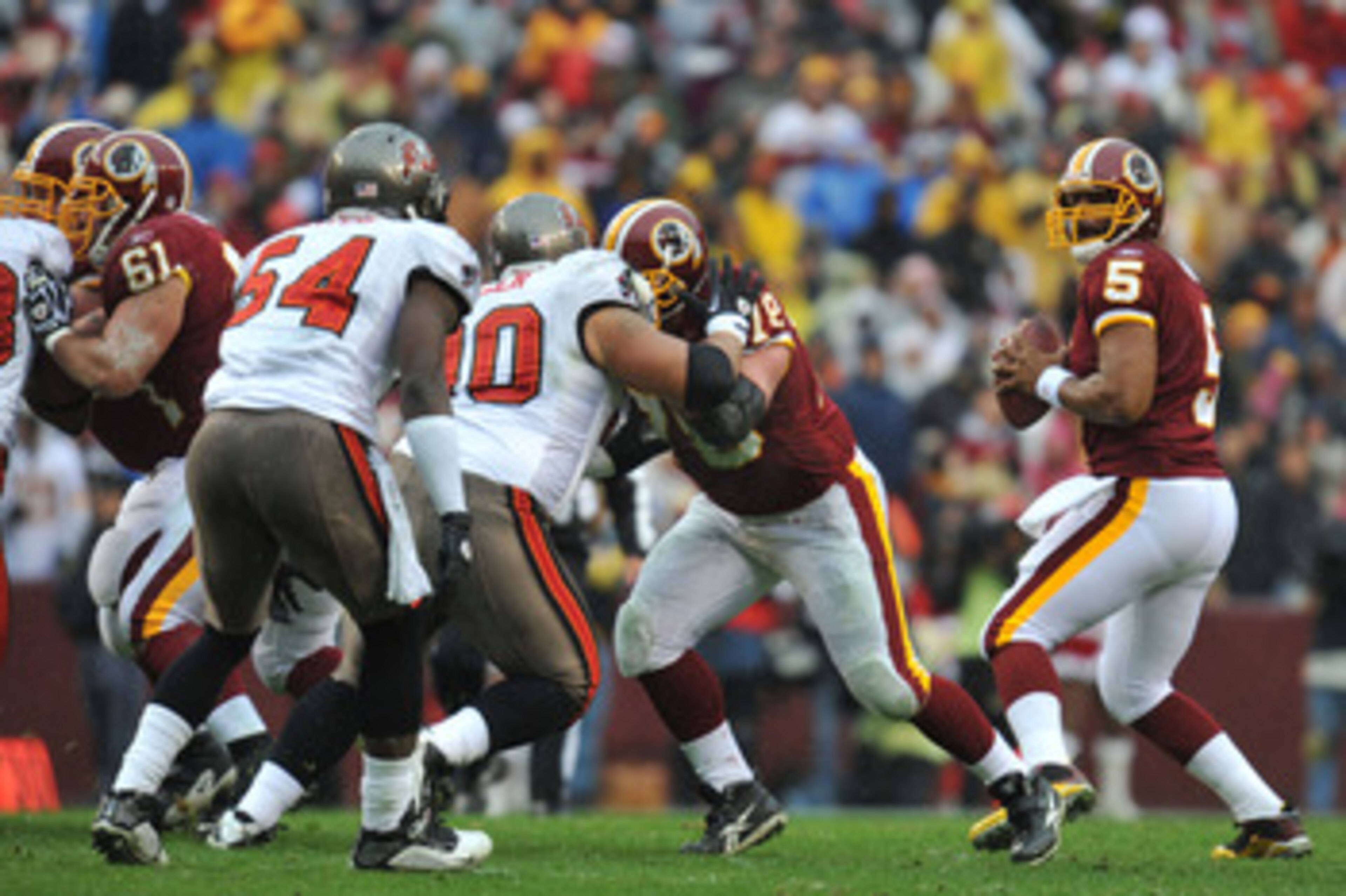 LANDOVER, MD - DECEMBER 12: Donovan McNabb #5 of the Washington Redskins passes against the Tampa Bay Buccaneers at FedExField on December 12, 2010 in Landover, Maryland. The Buccaneers defeated the Redskins 17-16. (Photo by Larry French/Getty Images) LANDOVER, MD - DECEMBER 12: Donovan McNabb #5 of the Washington Redskins passes against the Tampa Bay Buccaneers at FedExField on December 12, 2010 in Landover, Maryland. The Buccaneers defeated the Redskins 17-16. (Photo by Larry French/Getty Images)
