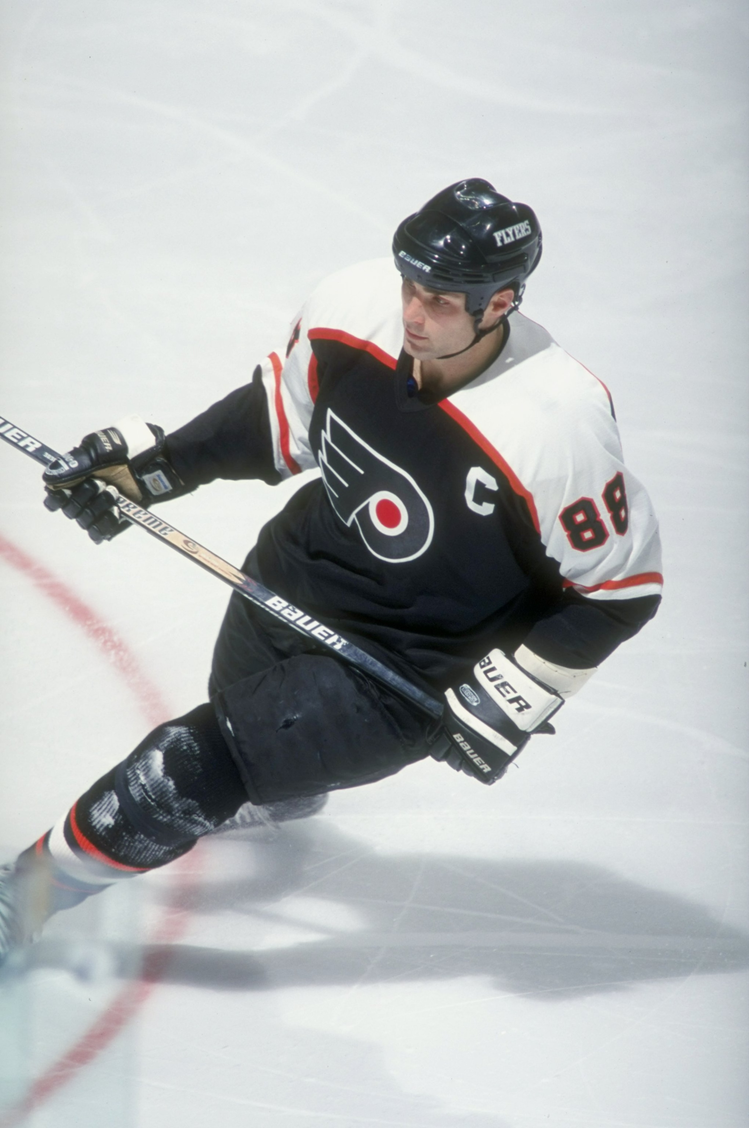 8 Dec 1998: Center Eric Lindros #88 of the Philadelphia Flyers in action against the New Jersey Devils at the Continental Airlines Arena in East Rutherford, New Jersey. The Flyers tied the Devils 5-5 after overtime. 8 Dec 1998: Center Eric Lindros #88 of the Philadelphia Flyers in action against the New Jersey Devils at the Continental Airlines Arena in East Rutherford, New Jersey. The Flyers tied the Devils 5-5 after overtime.