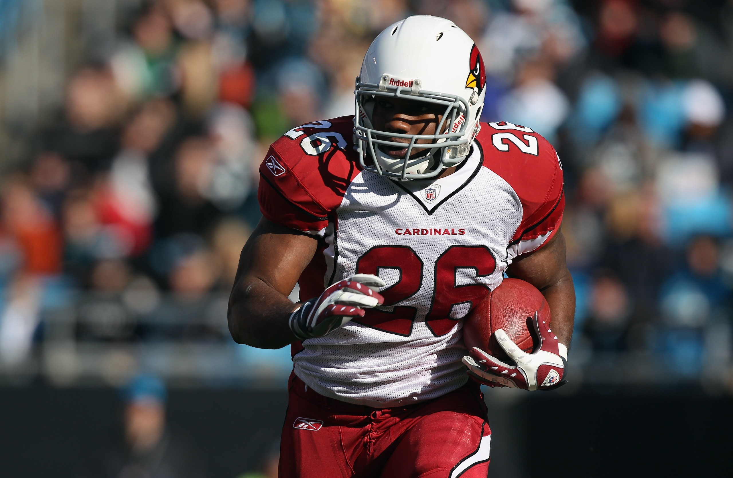 CHARLOTTE, NC - DECEMBER 19:  Beanie Wells #26 of the Arizona Cardinals runs with the ball against the Carolina Panthers during their game at Bank of America Stadium on December 19, 2010 in Charlotte, North Carolina.  (Photo by Streeter Lecka/Getty Images