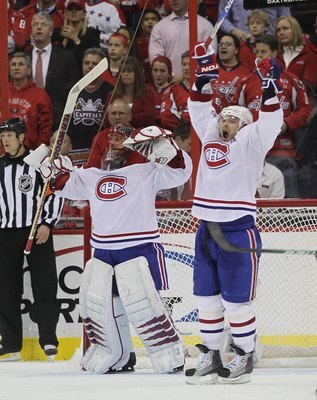 WASHINGTON - APRIL 28: Goaltender Jaroslav Halak #41 and Andrei Markov #79 of the Montreal Canadiens celebrate following a 2-1 defeat against the Washington Capitals in Game Seven of the Eastern Conference Quarterfinals during the 2010 NHL Stanley Cup Pla