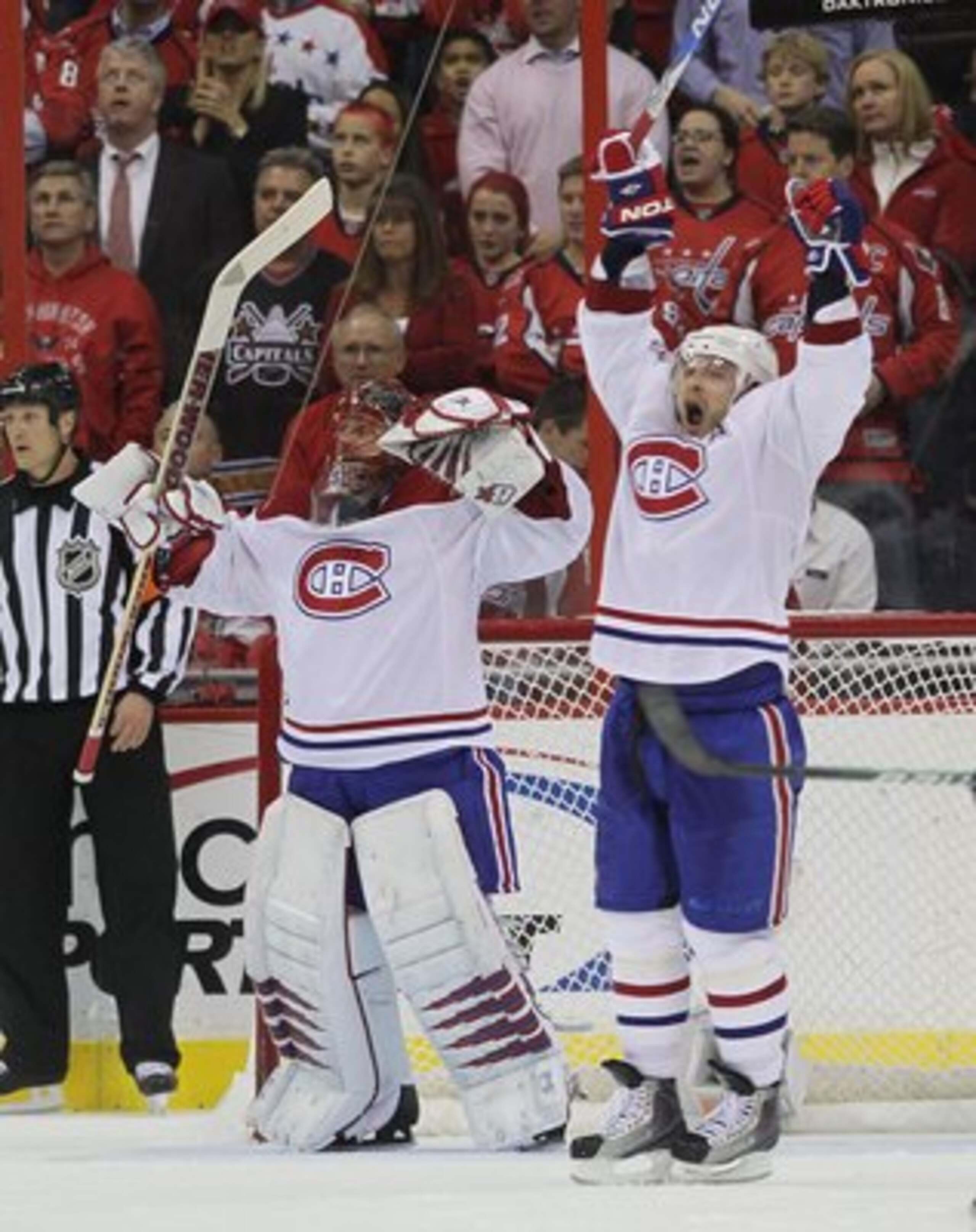 WASHINGTON - APRIL 28: Goaltender Jaroslav Halak #41 and Andrei Markov #79 of the Montreal Canadiens celebrate following a 2-1 defeat against the Washington Capitals in Game Seven of the Eastern Conference Quarterfinals during the 2010 NHL Stanley Cup Pla