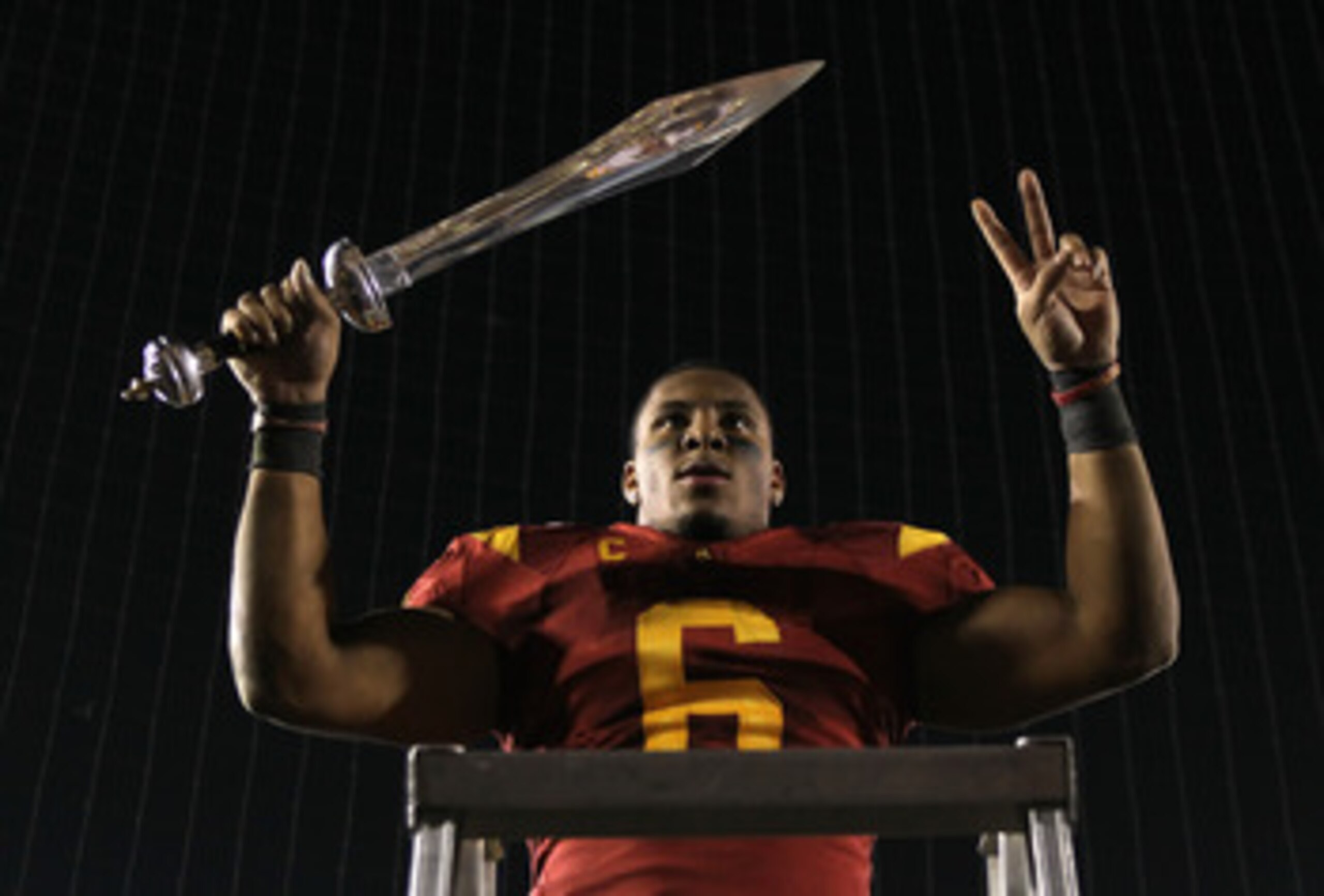 PASADENA, CA - DECEMBER 04: Malcolm Smith #6 of the USC Trojans celebrates following his teams victory over the UCLA Bruins at the Rose Bowl on December 4, 2010 in Pasadena, California. USC defeated UCLA 28-14. (Photo by Jeff Gross/Getty Images) PASADENA, CA - DECEMBER 04: Malcolm Smith #6 of the USC Trojans celebrates following his teams victory over the UCLA Bruins at the Rose Bowl on December 4, 2010 in Pasadena, California. USC defeated UCLA 28-14. (Photo by Jeff Gross/Getty Images)