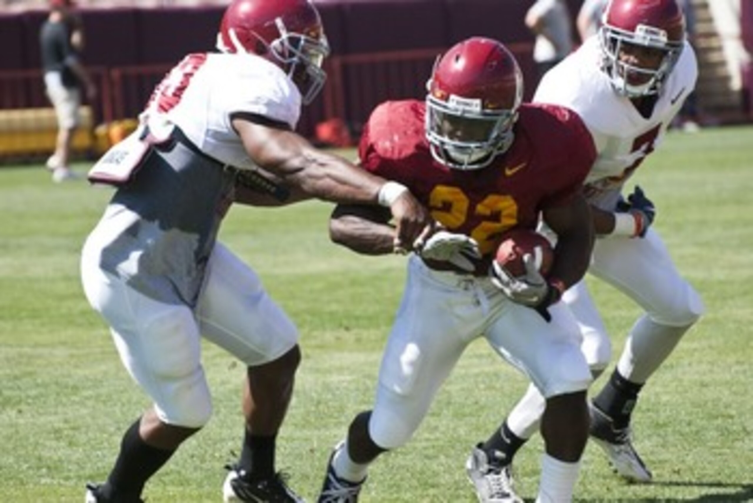 RB Curtis McNeal breaks tackle during spring practice RB Curtis McNeal breaks tackle during spring practice