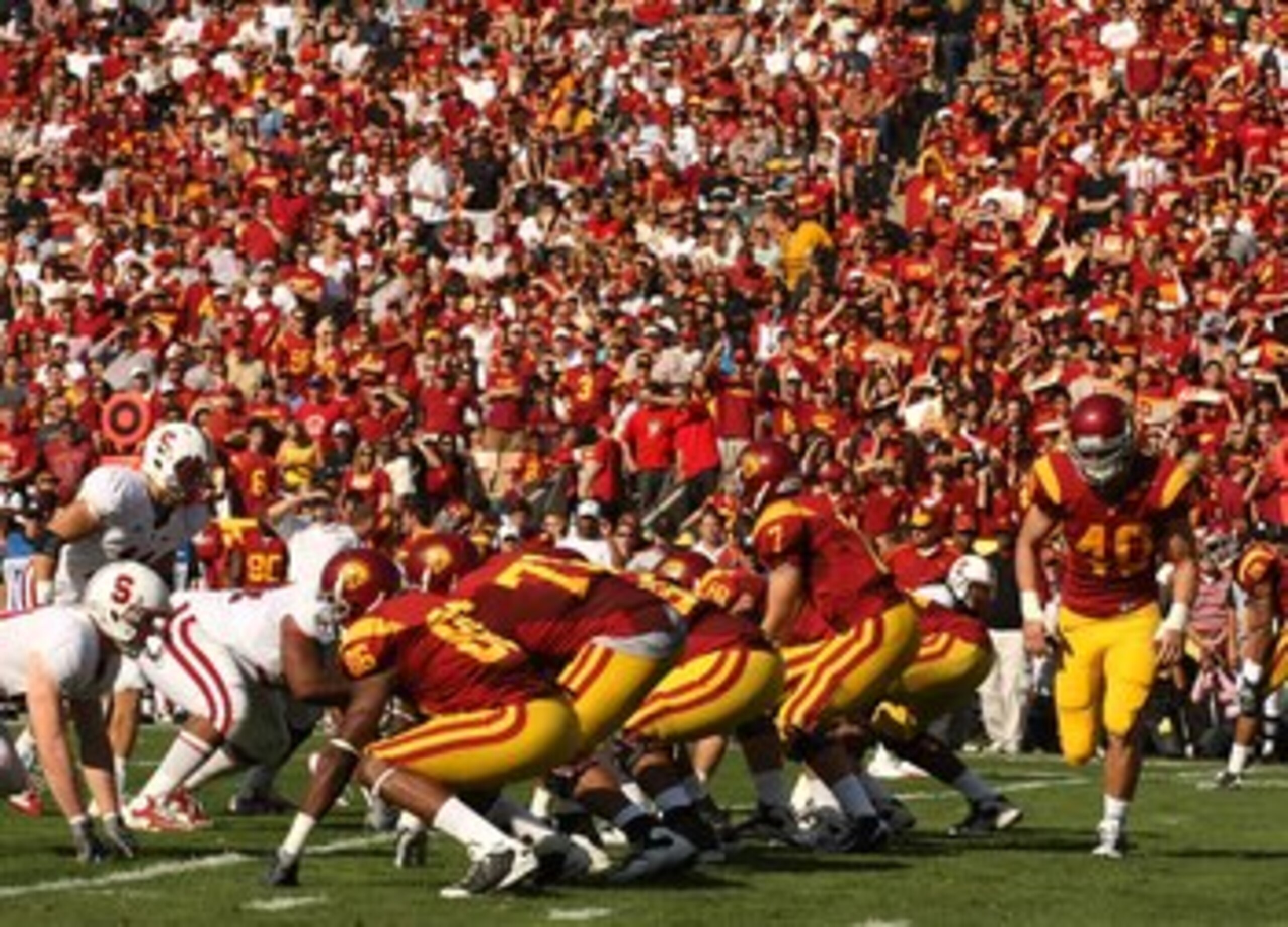 LOS ANGELES, CA - NOVEMBER 14: The USC Trojans offense sets on the line of scrimmage against the Stanford Cardinal on November 14, 2009 at the Los Angeles Coliseum in Los Angeles, California. Stanford won 55-21. (Photo by Stephen Dunn/Getty Images) LOS ANGELES, CA - NOVEMBER 14: The USC Trojans offense sets on the line of scrimmage against the Stanford Cardinal on November 14, 2009 at the Los Angeles Coliseum in Los Angeles, California. Stanford won 55-21. (Photo by Stephen Dunn/Getty Images)