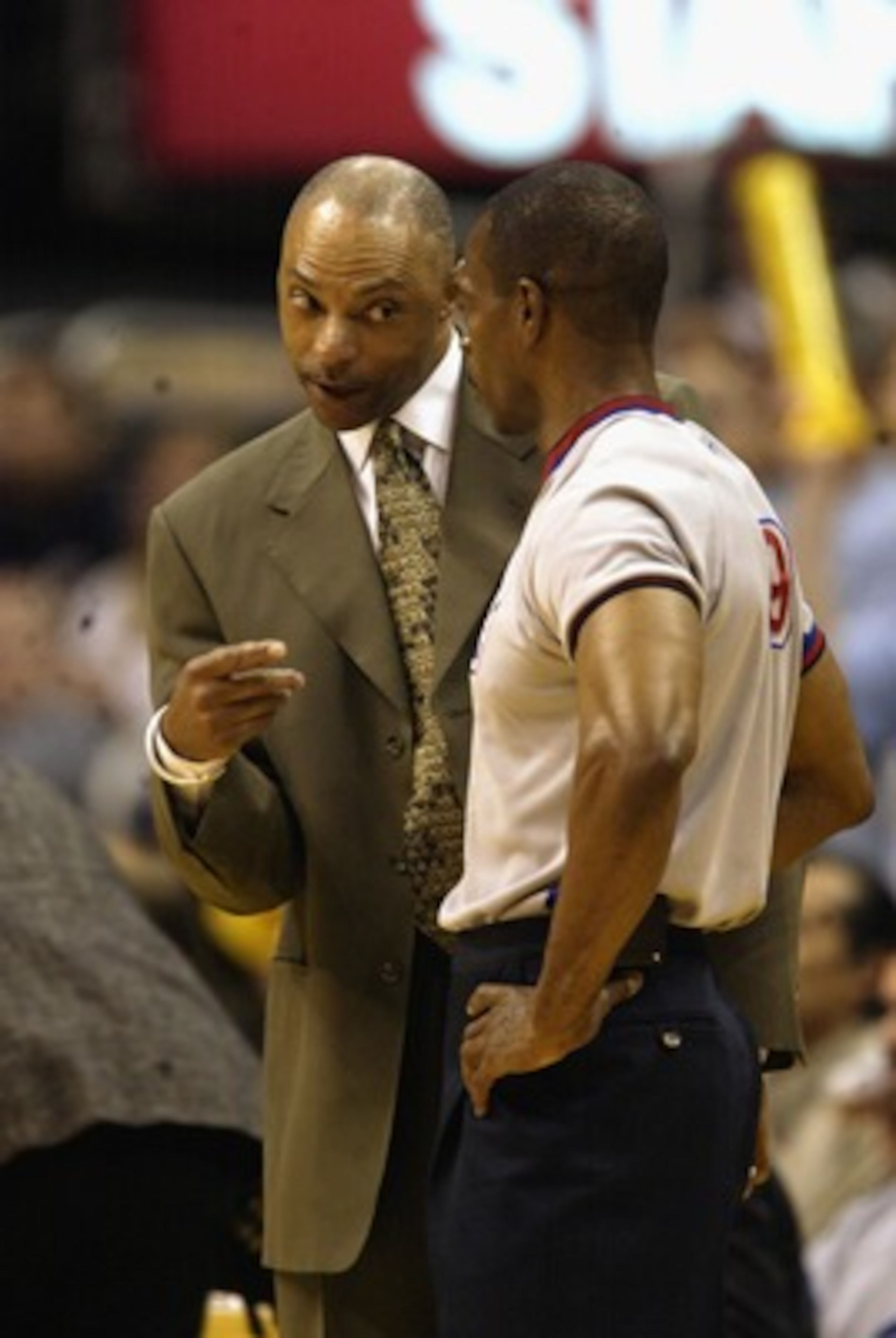 LOS ANGELES - MAY 11: Assistant coach Jim Cleamons of the Los Angeles Lakers argues with referee Tom Washington in Game four of the Western Conference Semifinals against the San Antonio Spurs during the 2003 NBA Playoffs on May 11, 2003 at Staples Center LOS ANGELES - MAY 11: Assistant coach Jim Cleamons of the Los Angeles Lakers argues with referee Tom Washington in Game four of the Western Conference Semifinals against the San Antonio Spurs during the 2003 NBA Playoffs on May 11, 2003 at Staples Center