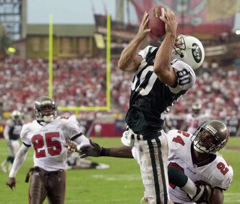 Wayne Chrebet catching a touchdown pass from Curtis Martin.