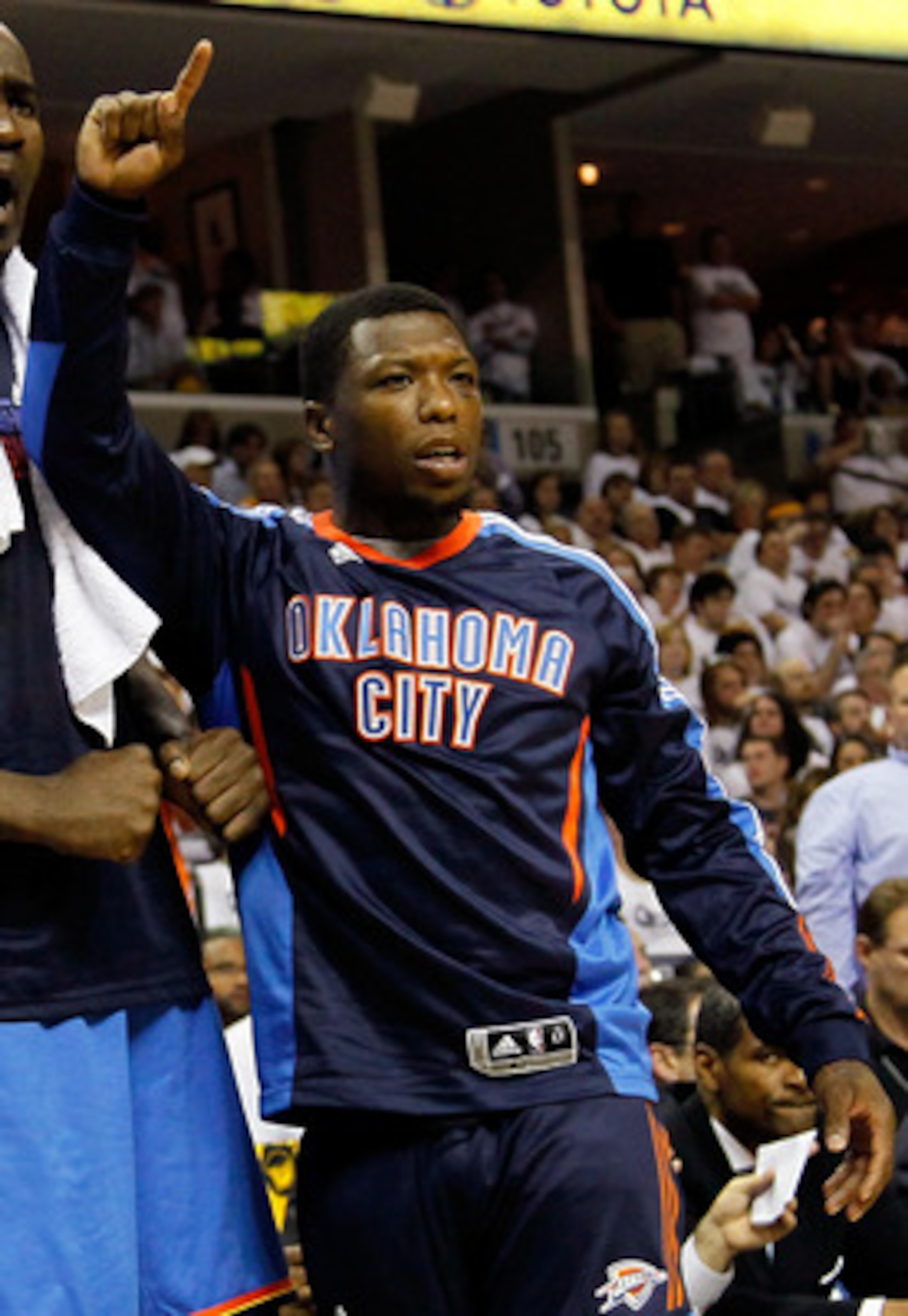 MEMPHIS, TN - MAY 13:  Serge Ibaka #9, Kendrick Perkins #5 and Nate Robinson #3 of the Oklahoma City Thunder react after a basket and a foul against the Memphis Grizzlies in Game Six of the Western Conference Semifinals in the 2011 NBA Playoffs at FedExFo