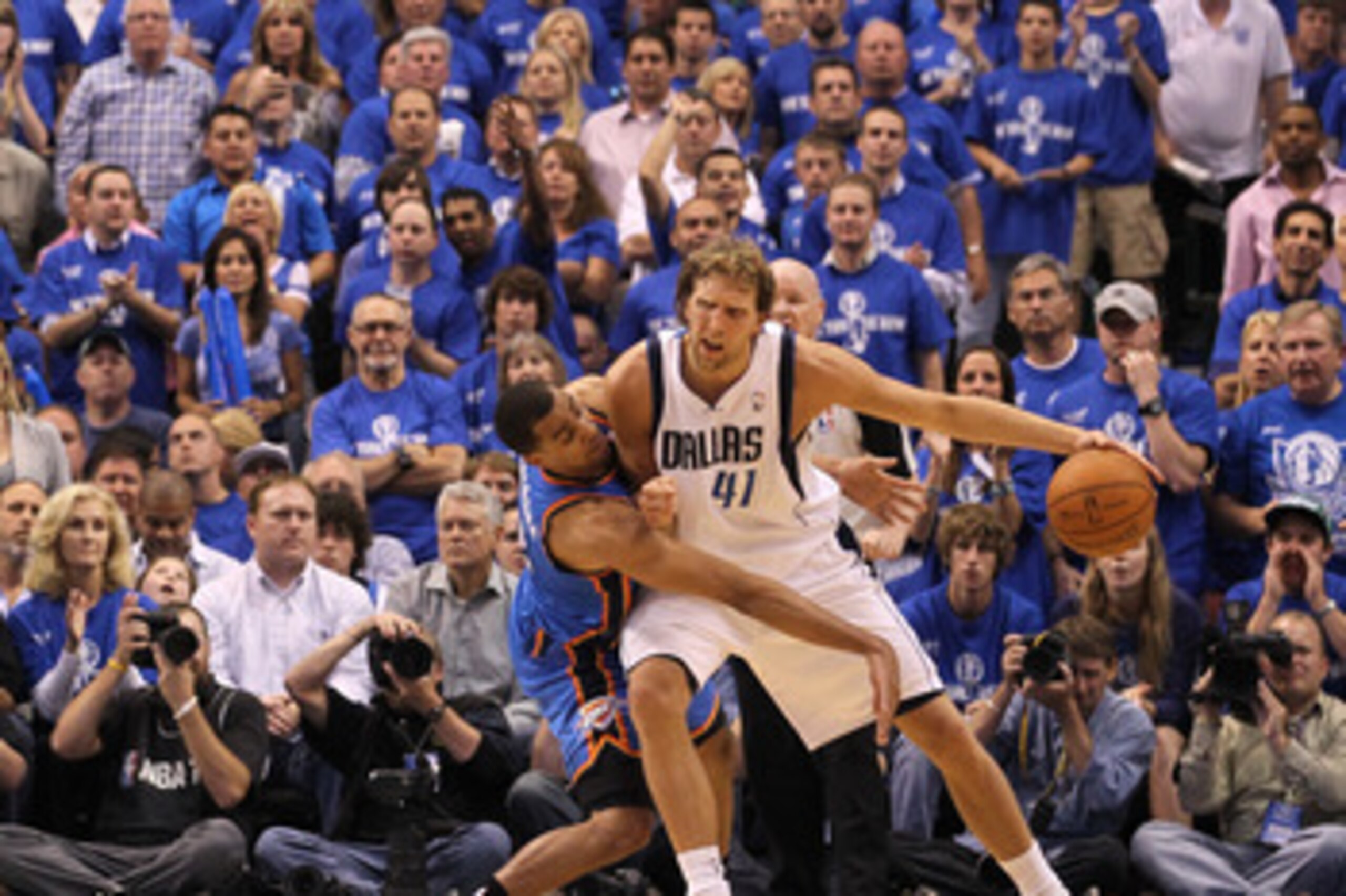 DALLAS, TX - MAY 17:  Dirk Nowitzki #41 of the Dallas Mavericks posts up Thabo Sefolosha #2 of the Oklahoma City Thunder in the second half in Game One of the Western Conference Finals during the 2011 NBA Playoffs at American Airlines Center on May 17, 20