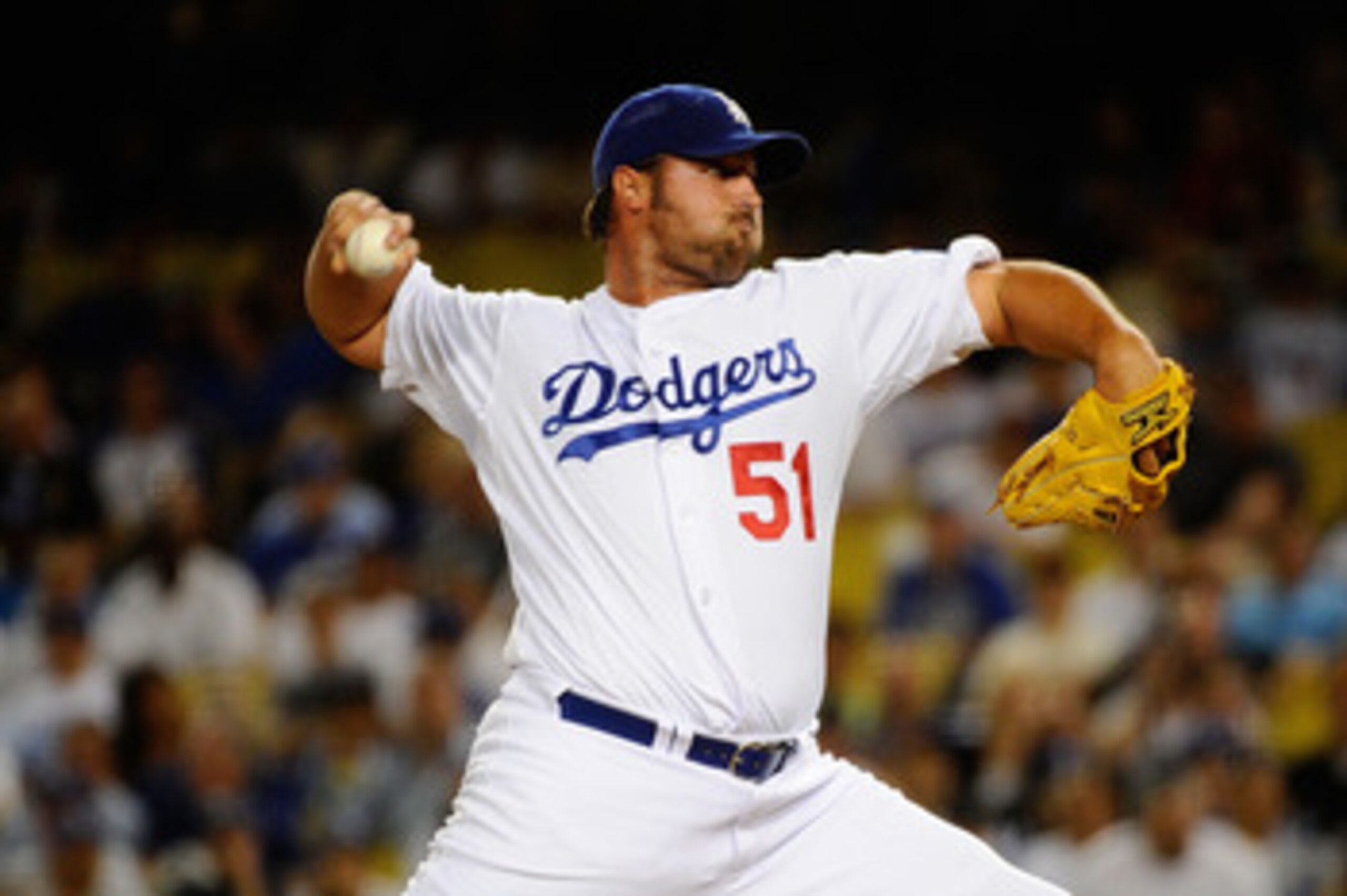 LOS ANGELES, CA - MARCH 31: Jonathan Broxton #51 of the Los Angeles Dodgers throws a pitch in the ninth inning against the San Francisco Giants on Opening Day at Dodger Stadium on March 31, 2011 in Los Angeles, California. (Photo by Kevork Djansezian/Ge LOS ANGELES, CA - MARCH 31: Jonathan Broxton #51 of the Los Angeles Dodgers throws a pitch in the ninth inning against the San Francisco Giants on Opening Day at Dodger Stadium on March 31, 2011 in Los Angeles, California. (Photo by Kevork Djansezian/Ge