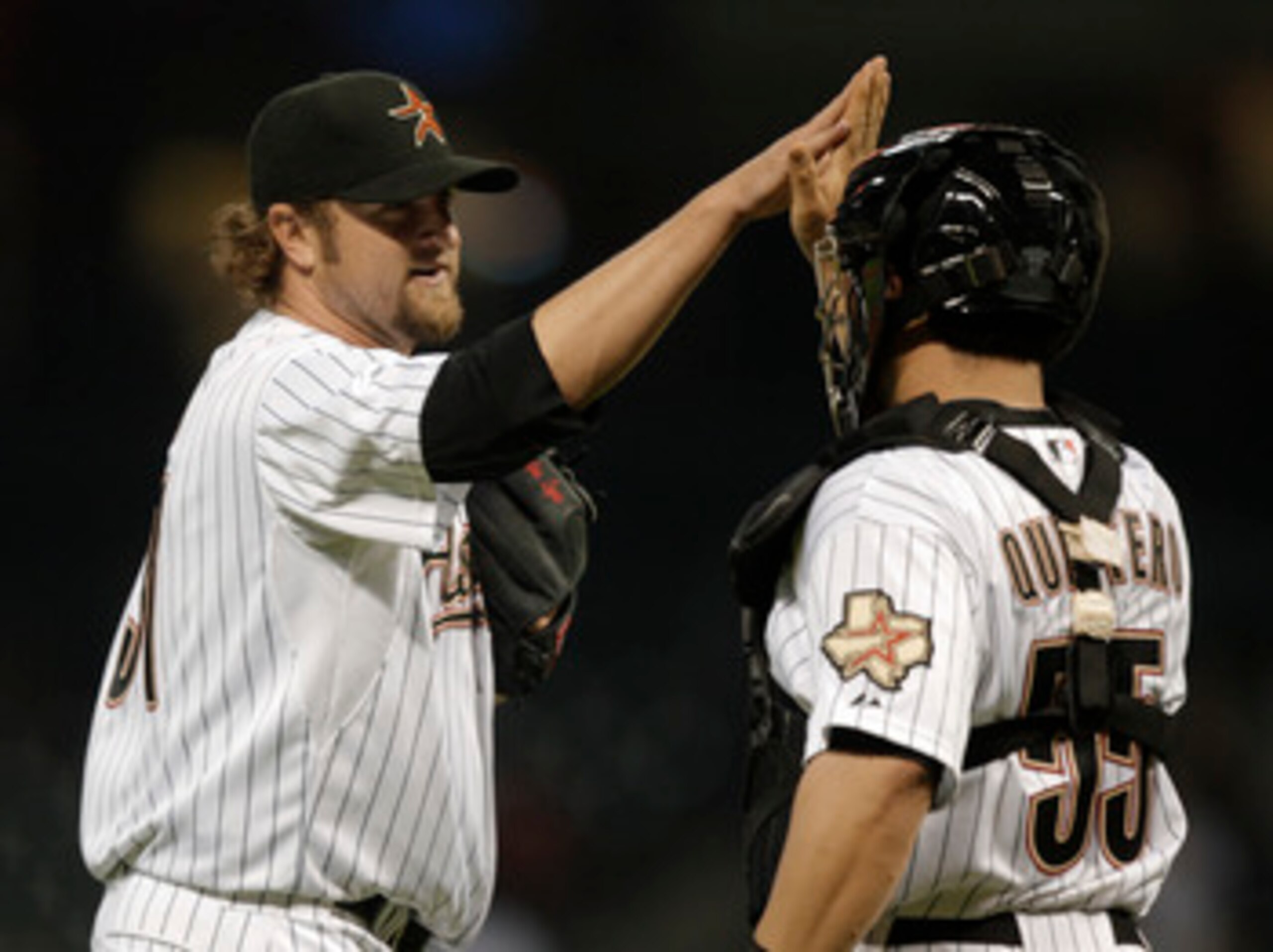 HOUSTON - APRIL 14: Pitcher Brandon Lyon #37 of the Houston Astros high fives catcher Humberto after getting the final out against San Diego Padres at Minute Maid Park on April 14, 2011 in Houston, Texas. (Photo by Bob Levey/Getty Images) HOUSTON - APRIL 14: Pitcher Brandon Lyon #37 of the Houston Astros high fives catcher Humberto after getting the final out against San Diego Padres at Minute Maid Park on April 14, 2011 in Houston, Texas. (Photo by Bob Levey/Getty Images)