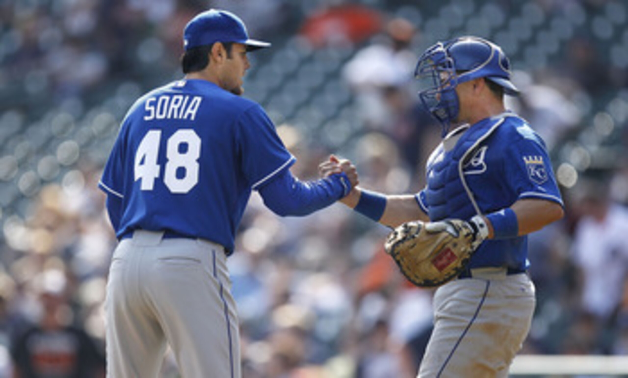 DETROIT, MI - APRIL 10: Joakim Soria #48 of the Kansas City Royals celebrates beating the Detroit Tigers 9-5 with Matt Treanor #15 at Comerica Park on April 10, 2011 in Detroit, Michigan. (Photo by Gregory Shamus/Getty Images) DETROIT, MI - APRIL 10: Joakim Soria #48 of the Kansas City Royals celebrates beating the Detroit Tigers 9-5 with Matt Treanor #15 at Comerica Park on April 10, 2011 in Detroit, Michigan. (Photo by Gregory Shamus/Getty Images)