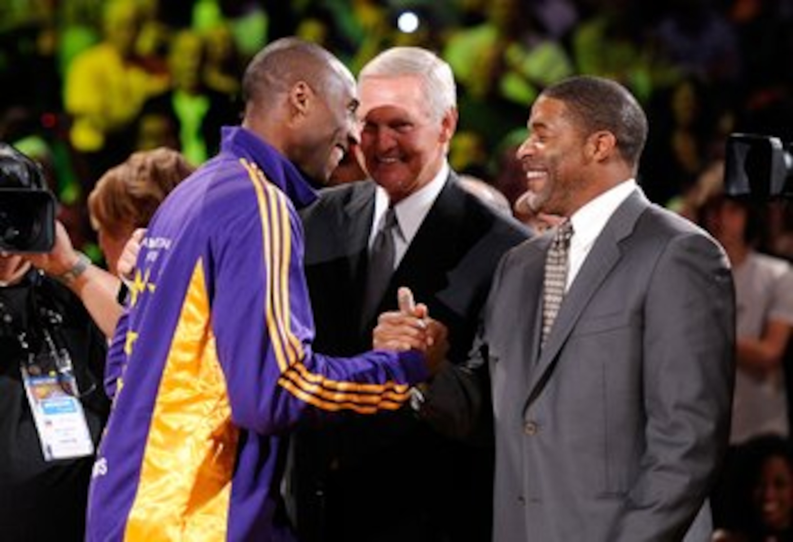 LOS ANGELES, CA - OCTOBER 27: (L-R) Kobe Bryant #24 of the Los Angeles Lakers is congratulated by former Laker champions Jerry West and Norm Nixon after receiving his 2009 NBA Championship ring before the season opening game against the Los Angeles Clipp LOS ANGELES, CA - OCTOBER 27: (L-R) Kobe Bryant #24 of the Los Angeles Lakers is congratulated by former Laker champions Jerry West and Norm Nixon after receiving his 2009 NBA Championship ring before the season opening game against the Los Angeles Clipp