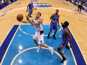 DALLAS, TX - MAY 17:  Jose Juan Barea #11 of the Dallas Mavericks goes up for a shot against James Harden #13 of the Oklahoma City Thunder in the second half in Game One of the Western Conference Finals during the 2011 NBA Playoffs at American Airlines Ce