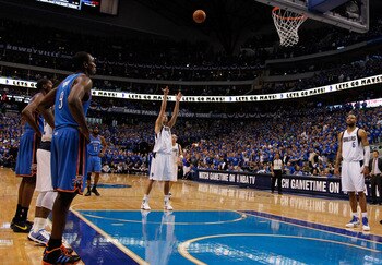 DALLAS, TX - MAY 17:  Dirk Nowitzki #41 of the Dallas Mavericks shoots a free throw late in the fourth quarter while taking on the Oklahoma City Thunder in Game One of the Western Conference Finals during the 2011 NBA Playoffs at American Airlines Center