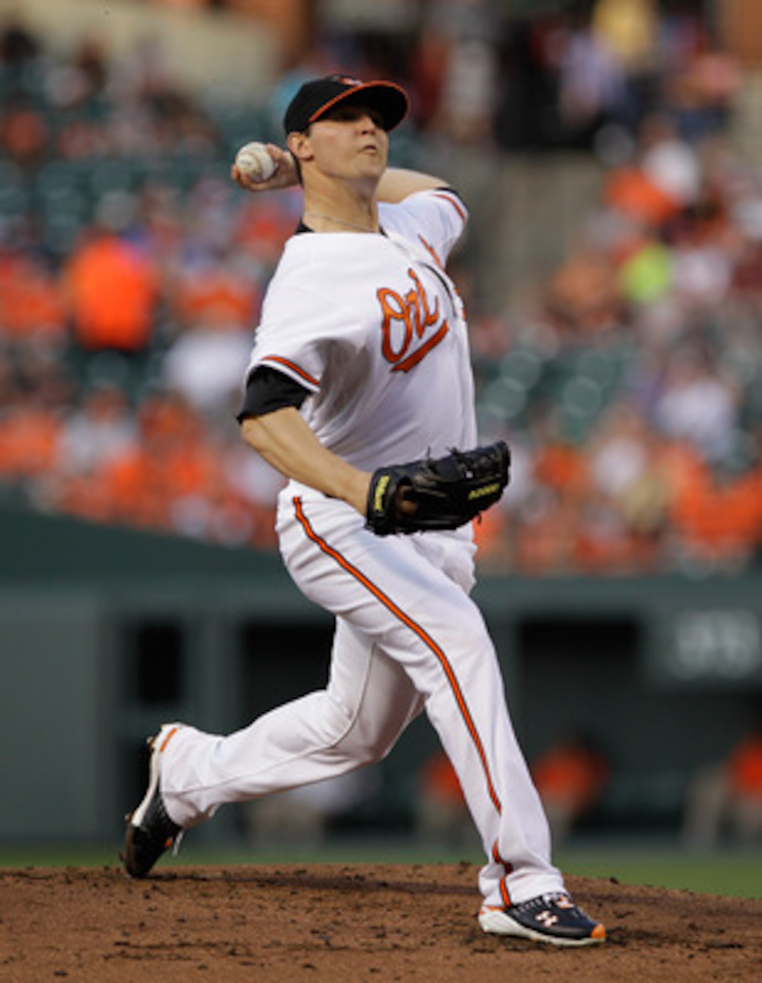 BALTIMORE, MD - MAY 12:  Starting pitcher Zach Britton #53 of the Baltimore Orioles delivers to a Seattle Mariners batter at Oriole Park at Camden Yards on May 12, 2011 in Baltimore, Maryland.  (Photo by Rob Carr/Getty Images)