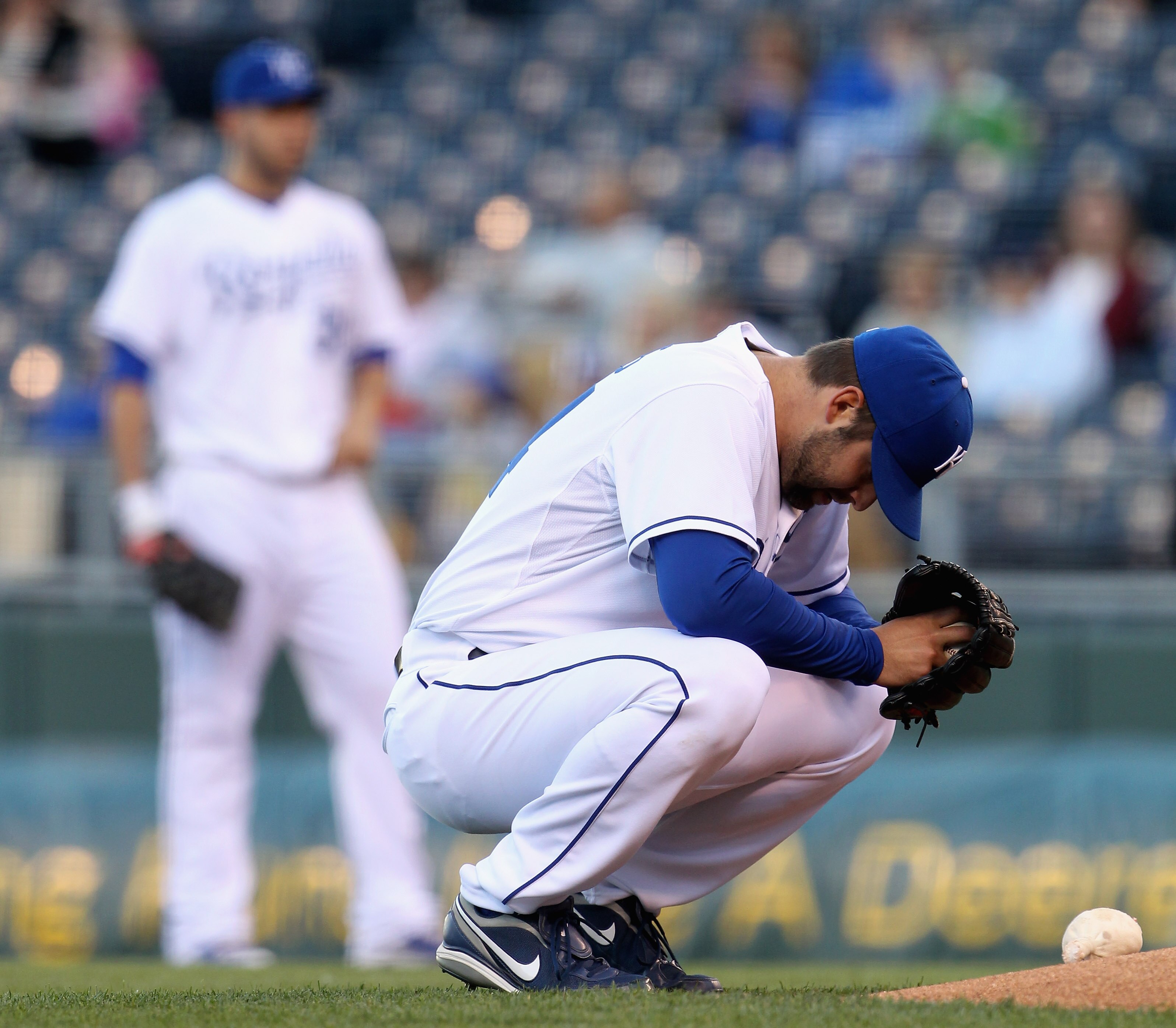 KANSAS CITY, MO - MAY 16: Starting pitcher Kyle Davies #34 of the Kansas City Royals prays just prior to the start of the game against the Cleveland Indians on May 16, 2011 at Kauffman Stadium in Kansas City, Missouri. Davies left the game due to injury KANSAS CITY, MO - MAY 16: Starting pitcher Kyle Davies #34 of the Kansas City Royals prays just prior to the start of the game against the Cleveland Indians on May 16, 2011 at Kauffman Stadium in Kansas City, Missouri. Davies left the game due to injury