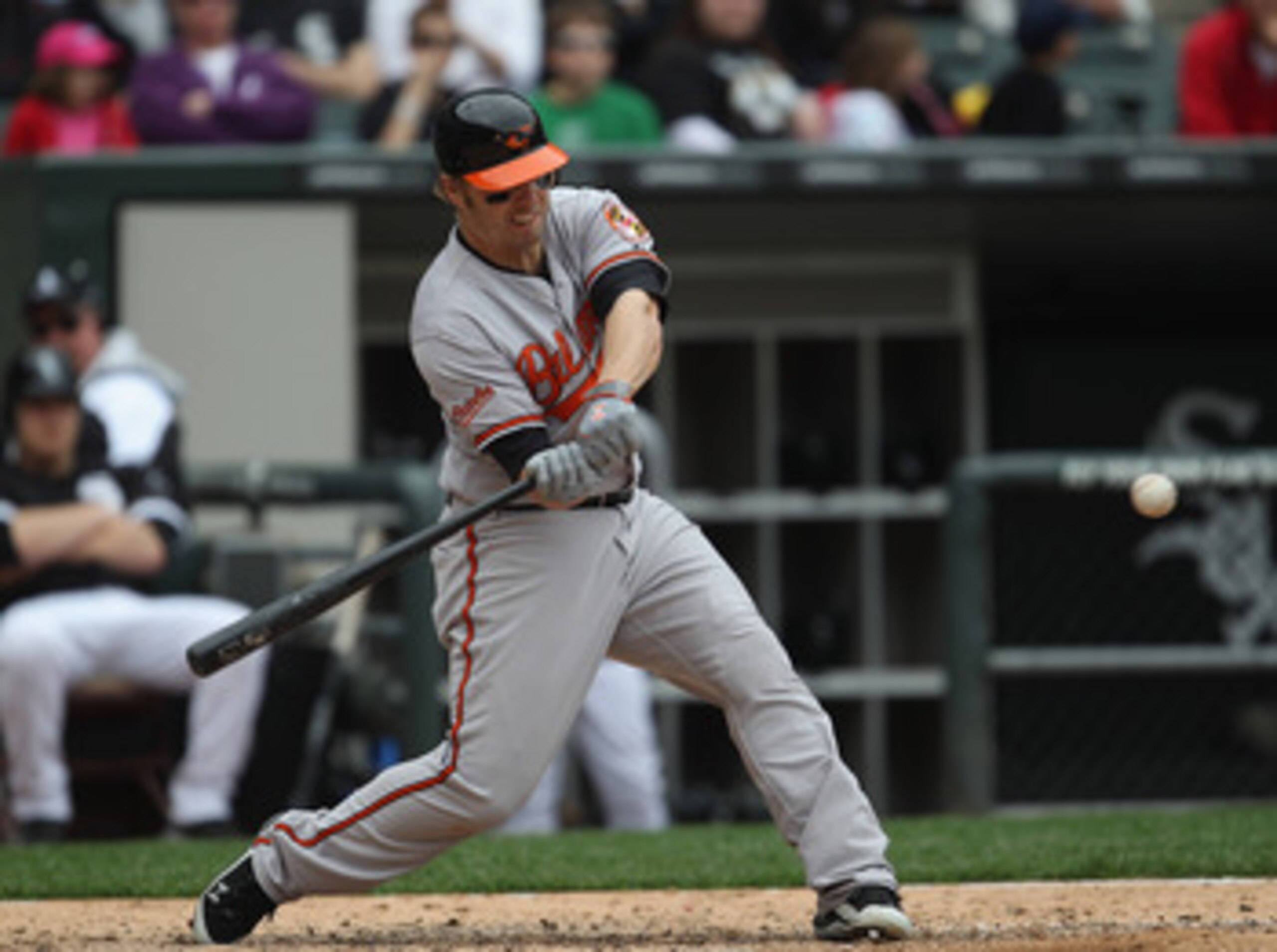 CHICAGO, IL - MAY 01: Mark Reynolds #12 of the Baltimore Orioles hits the ball against the Chicago White Sox at U.S. Cellular Field on May 1, 2011 in Chicago, Illinois. The Orioles defeated the White Sox 6-4. (Photo by Jonathan Daniel/Getty Images)