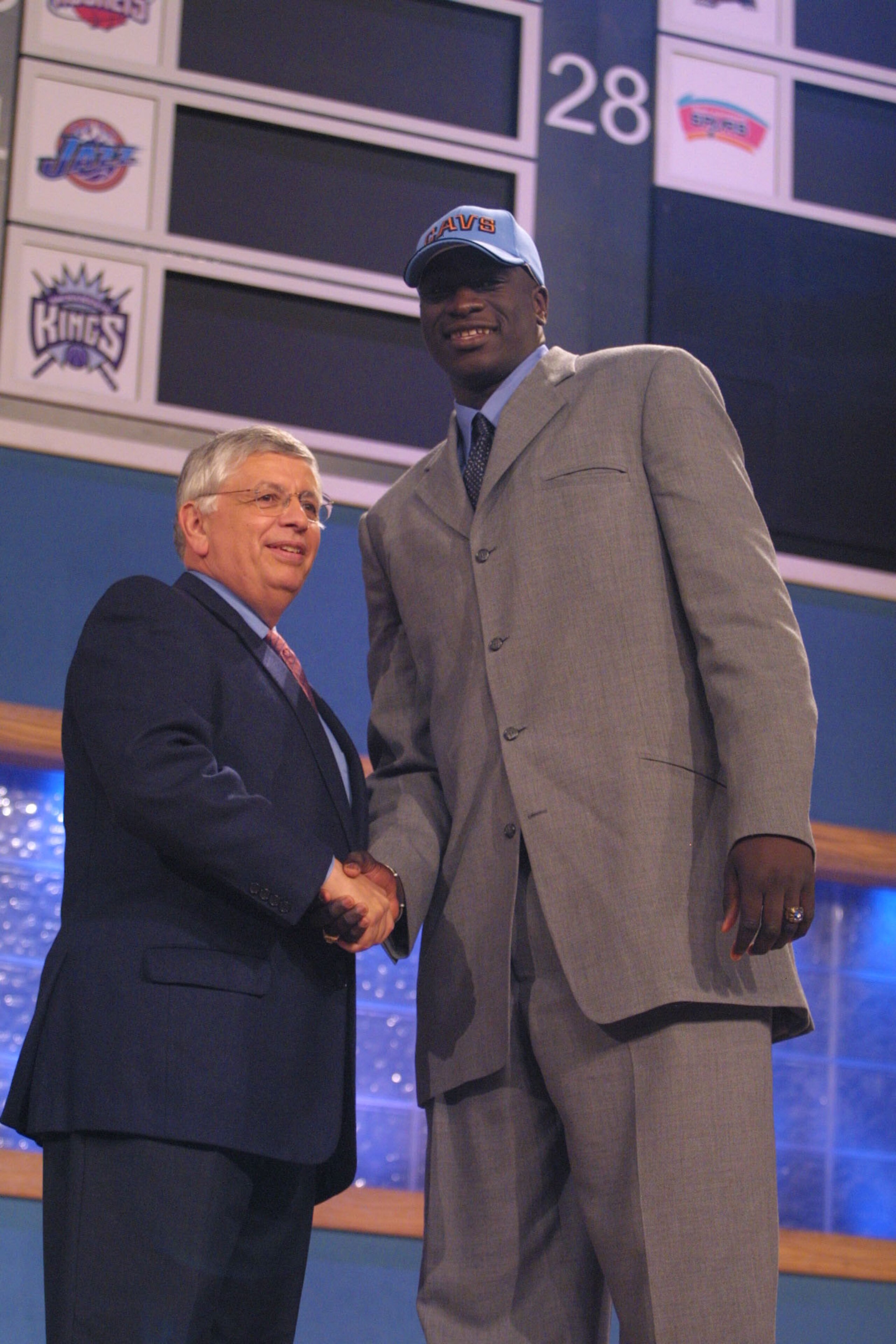 27 Jun 2001:  NBA Commisioner David Stern congratulates Desagana Diop of Oak HillsAcadamy in Wilson, Virginia after being picked eighth in the NBA Draft by the Cleveland Caveliers at the Theatre in Madison Square Garden in New York City. Mandatory Credit: