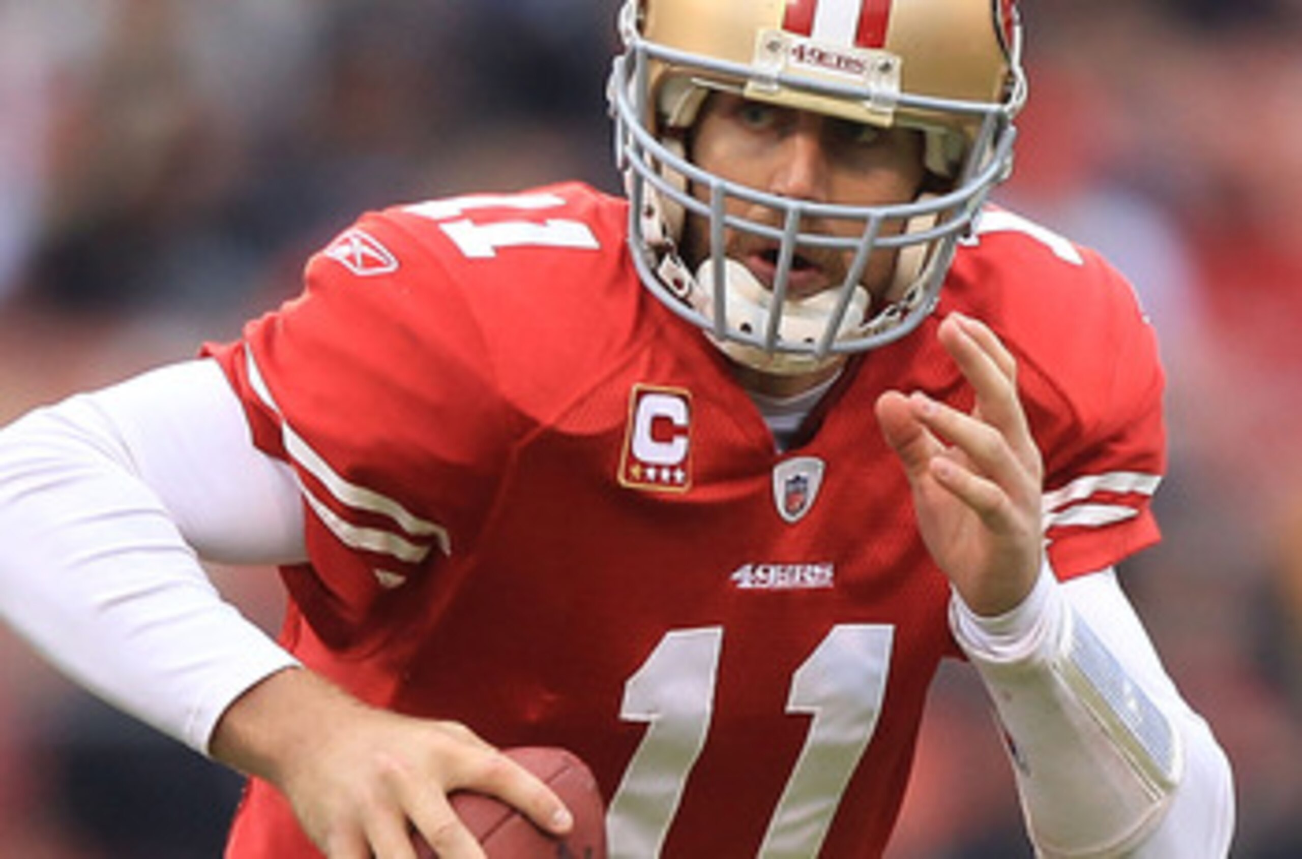 SAN FRANCISCO, CA - JANUARY 02:    Alex Smith #11 of the San Francisco 49ers runs against the Arizona Cardinals during an NFL game at Candlestick Park on January 2, 2011 in San Francisco, California.  (Photo by Jed Jacobsohn/Getty Images)