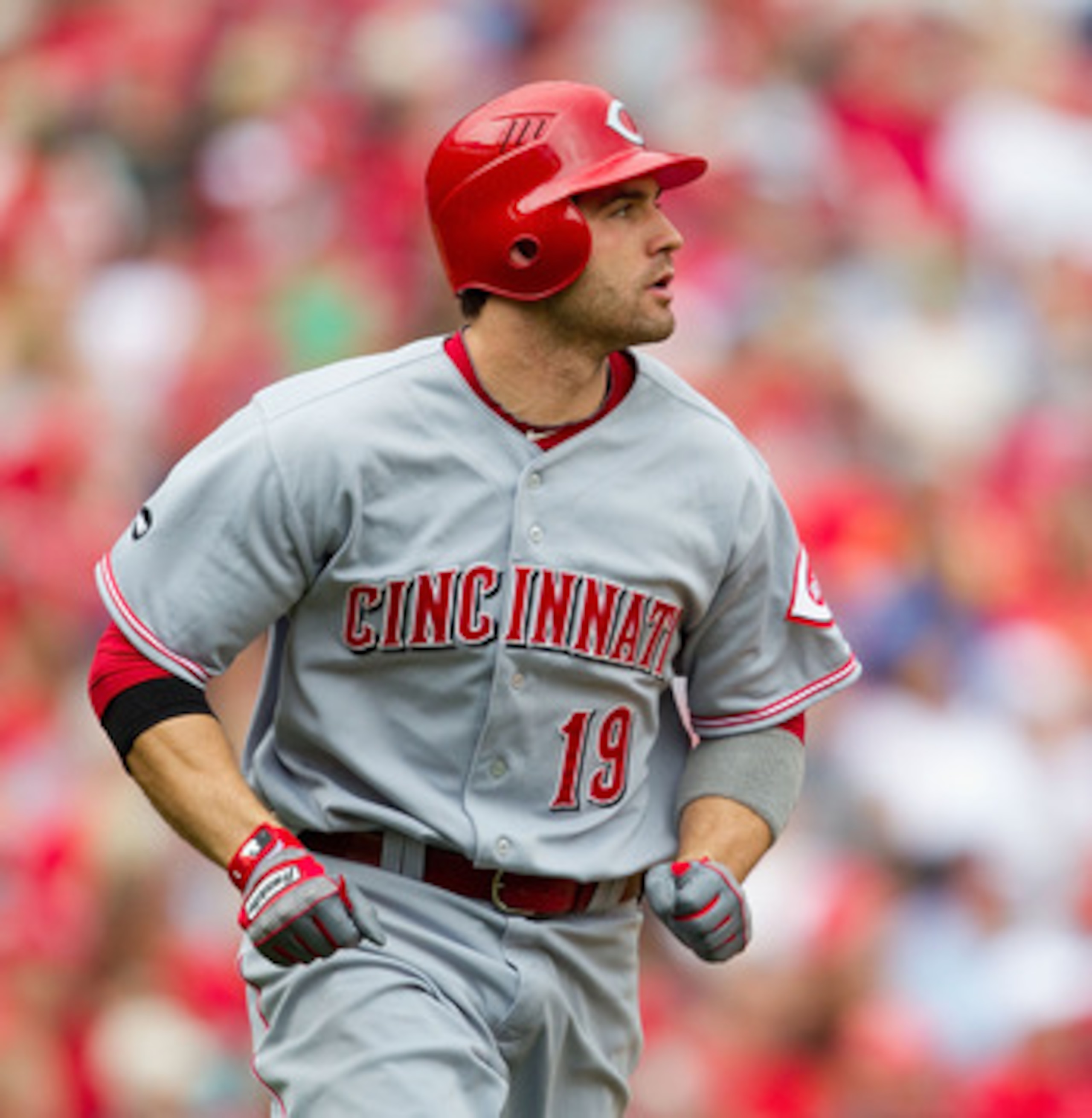 ST. LOUIS, MO - APRIL 23: Joey Votto #19 of the Cincinnati Reds watches his two-run home run leave the park against the St. Louis Cardinals at Busch Stadium on April 23, 2011 in St. Louis, Missouri.  (Photo by Dilip Vishwanat/Getty Images)