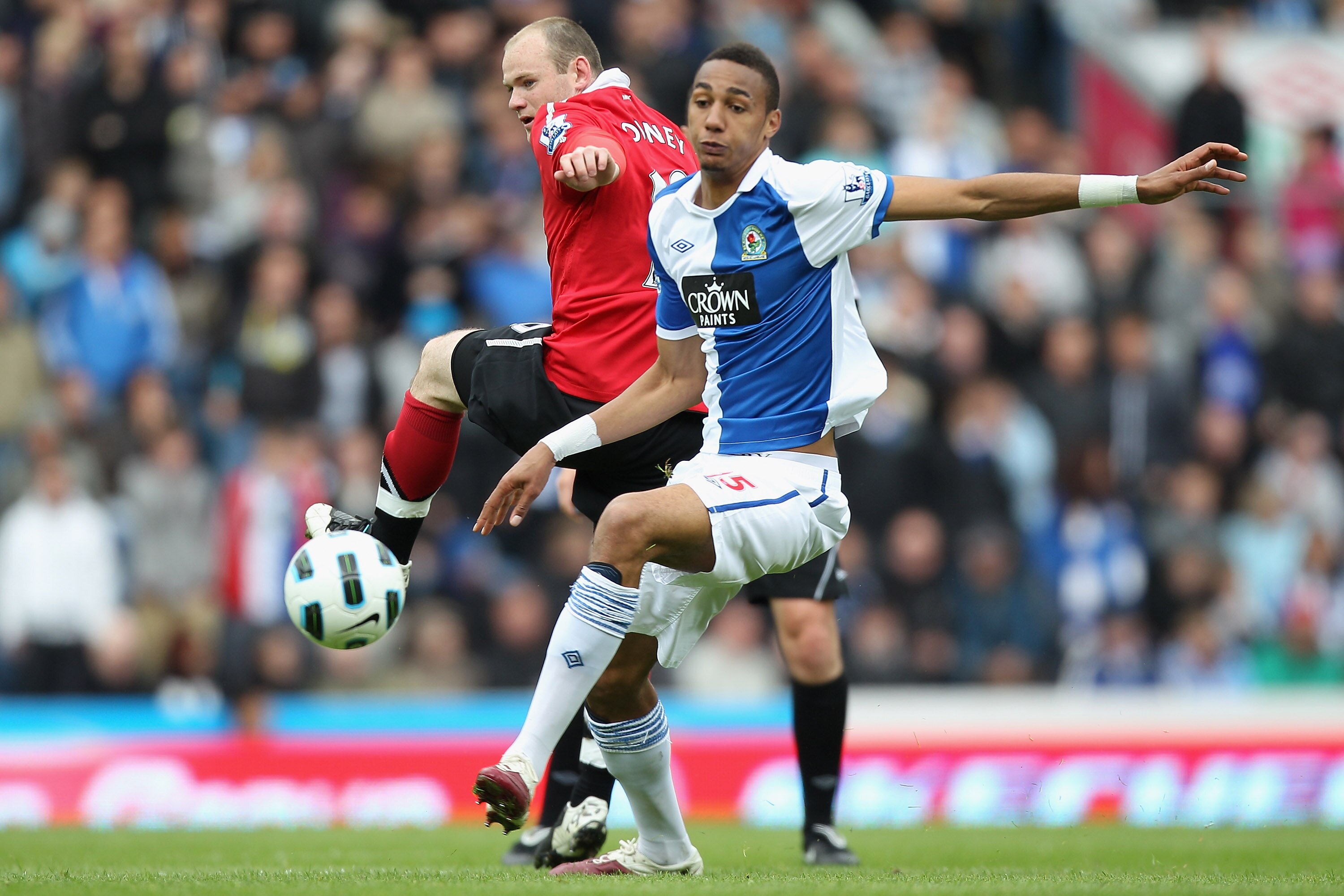 BLACKBURN, ENGLAND - MAY 14:  Wayne Rooney (L) of Manchester United and Steven Nzonzi (R) of Blackburn Rovers during the Barclays Premier League match between Blackburn Rovers and Manchester United at Ewood Park on May 14, 2011 in Blackburn, England.  (Ph