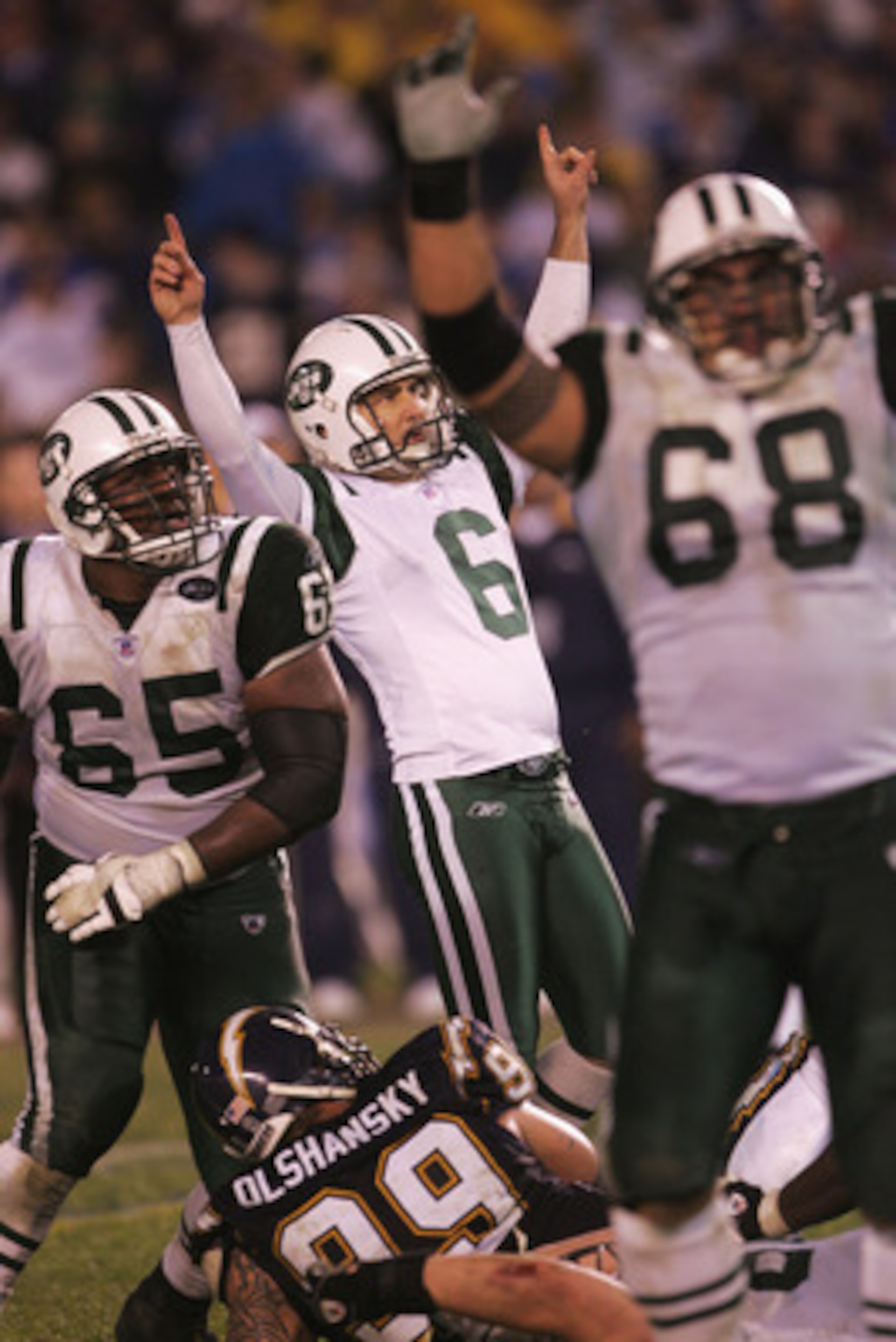 SAN DIEGO - JANUARY 08:  Kicker Doug Brien #6 of the New York Jets celebrates after kicking the game winning field goal in overtime against the San Diego Chargers during the AFC wild-card game at Qualcomm Stadium on January 8, 2005 in San Diego, Californi