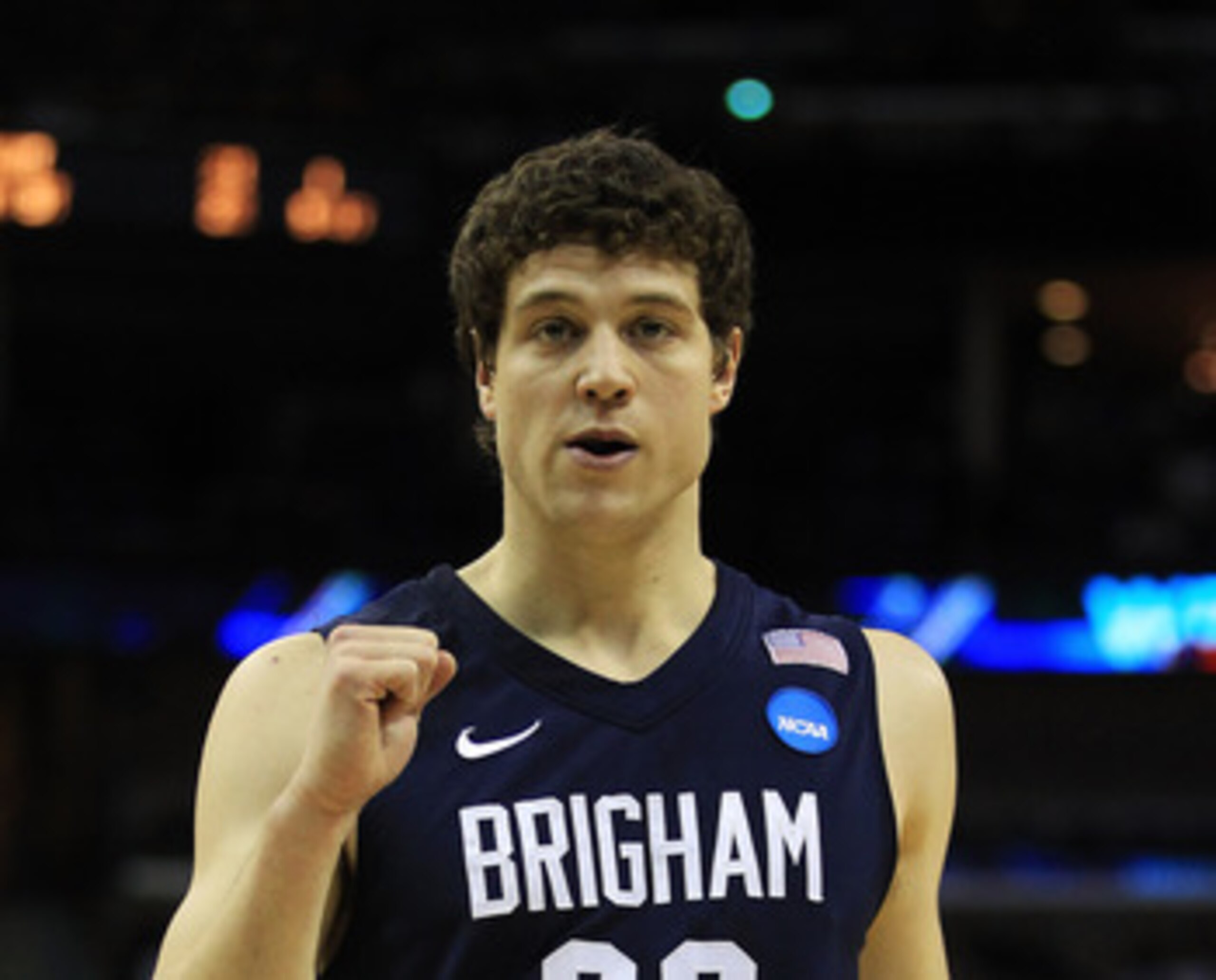 NEW ORLEANS, LA - MARCH 24:  Jimmer Fredette #32 of the Brigham Young Cougars celebrates against the Florida Gators during the Southeast regional of the 2011 NCAA men's basketball tournament at New Orleans Arena on March 24, 2011 in New Orleans, Louisiana