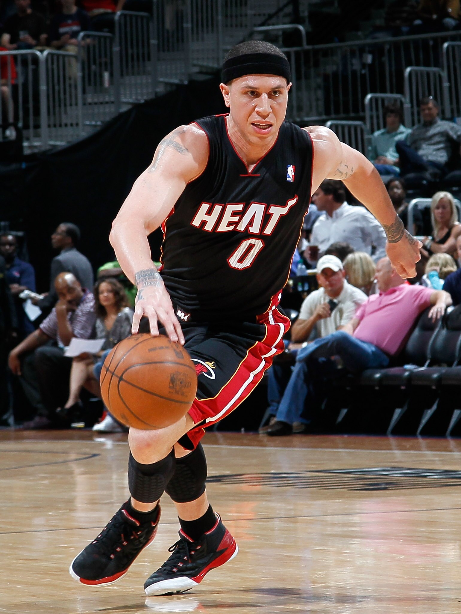 ATLANTA, GA - APRIL 11:  Mike Bibby #0 of the Miami Heat against the Atlanta Hawks at Philips Arena on April 11, 2011 in Atlanta, Georgia.  NOTE TO USER: User expressly acknowledges and agrees that, by downloading and/or using this Photograph, user is con