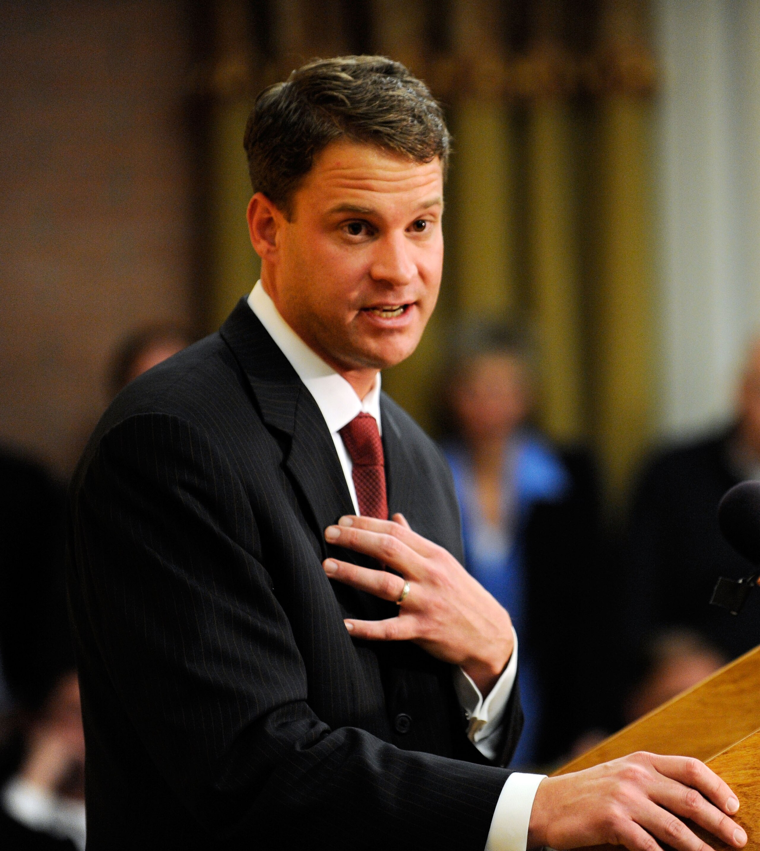 LOS ANGELES, CA - JANUARY 13:  Lane Kiffin (L)  the new college football coach of University of Southern California speaks during a news conference at Heritage Hall on the campus of USC on January 13, 2010 in Los Angeles, California.  (Photo by Kevork Dja