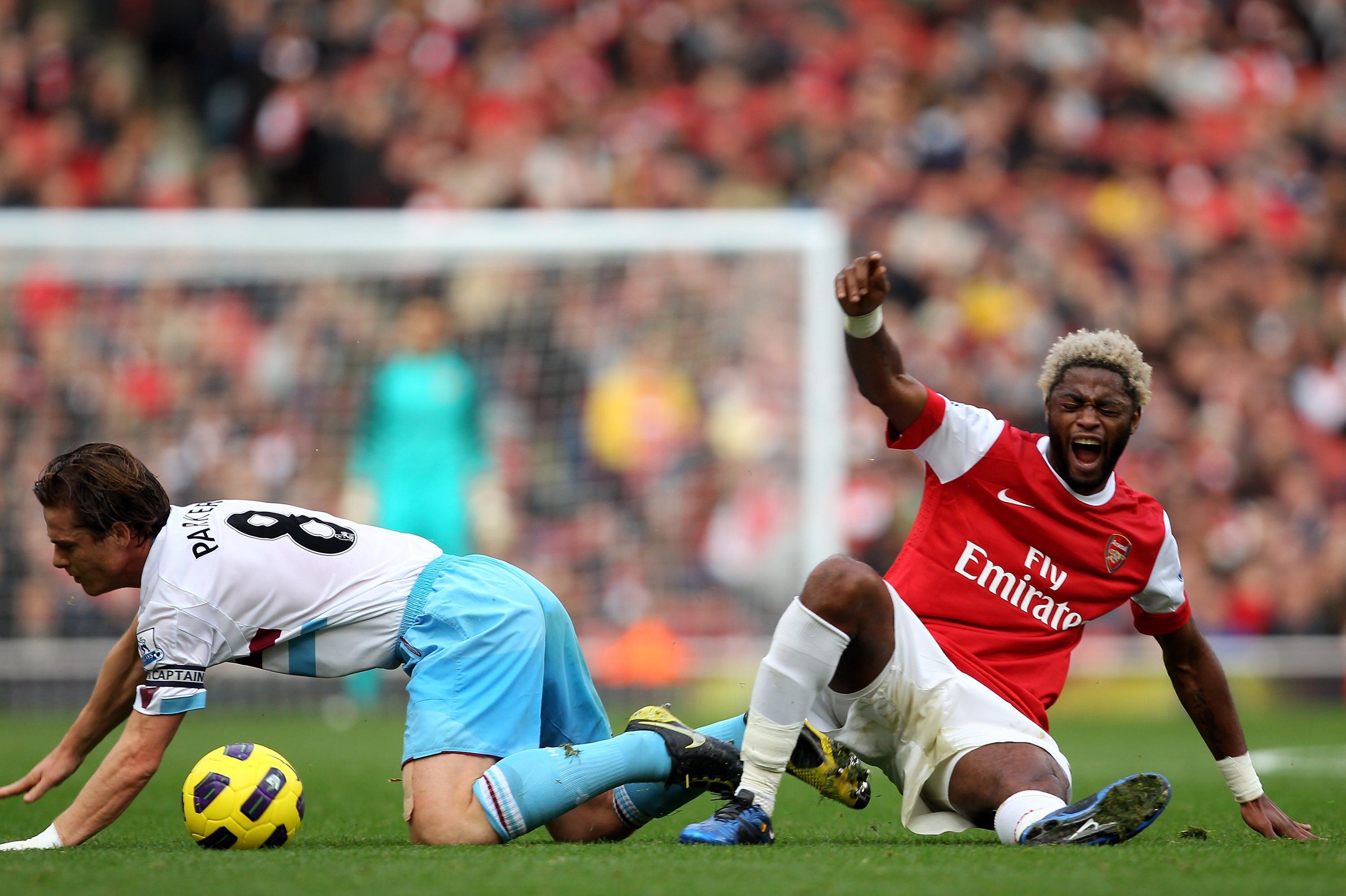LONDON, ENGLAND - OCTOBER 30:  Scott Parker of West Ham clashes with Alex Song of Arsenal during the Barclays Premier League match between Arsenal and West Ham United at Emirates Stadium on October 30, 2010 in London, England.  (Photo by Clive Rose/Getty