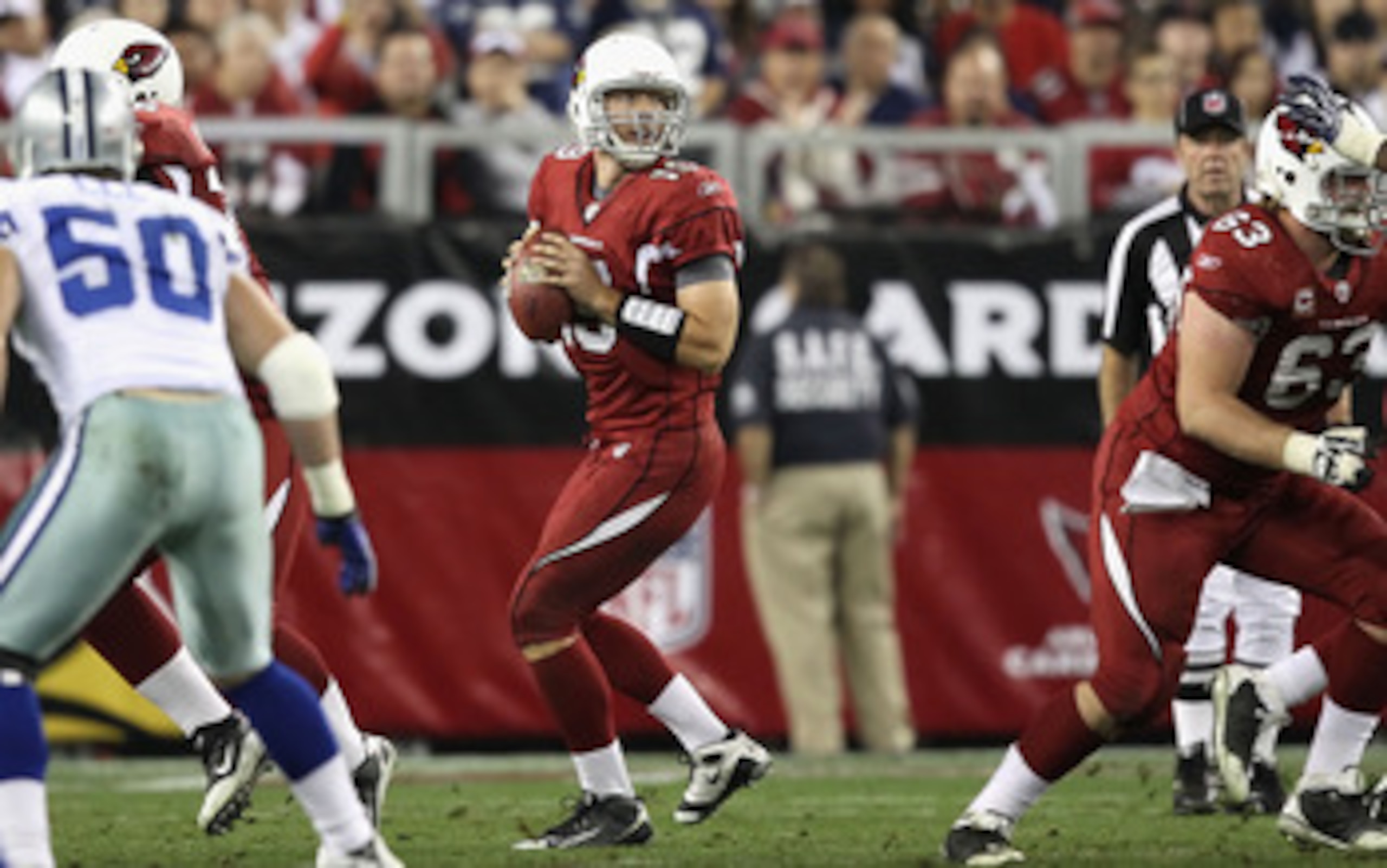 GLENDALE, AZ - DECEMBER 25:  Quarterback John Skelton #19 of the Arizona Cardinals drops back to half during the NFL game against the Dallas Cowboys at the University of Phoenix Stadium on December 25, 2010 in Glendale, Arizona. The Cardinals defeated the