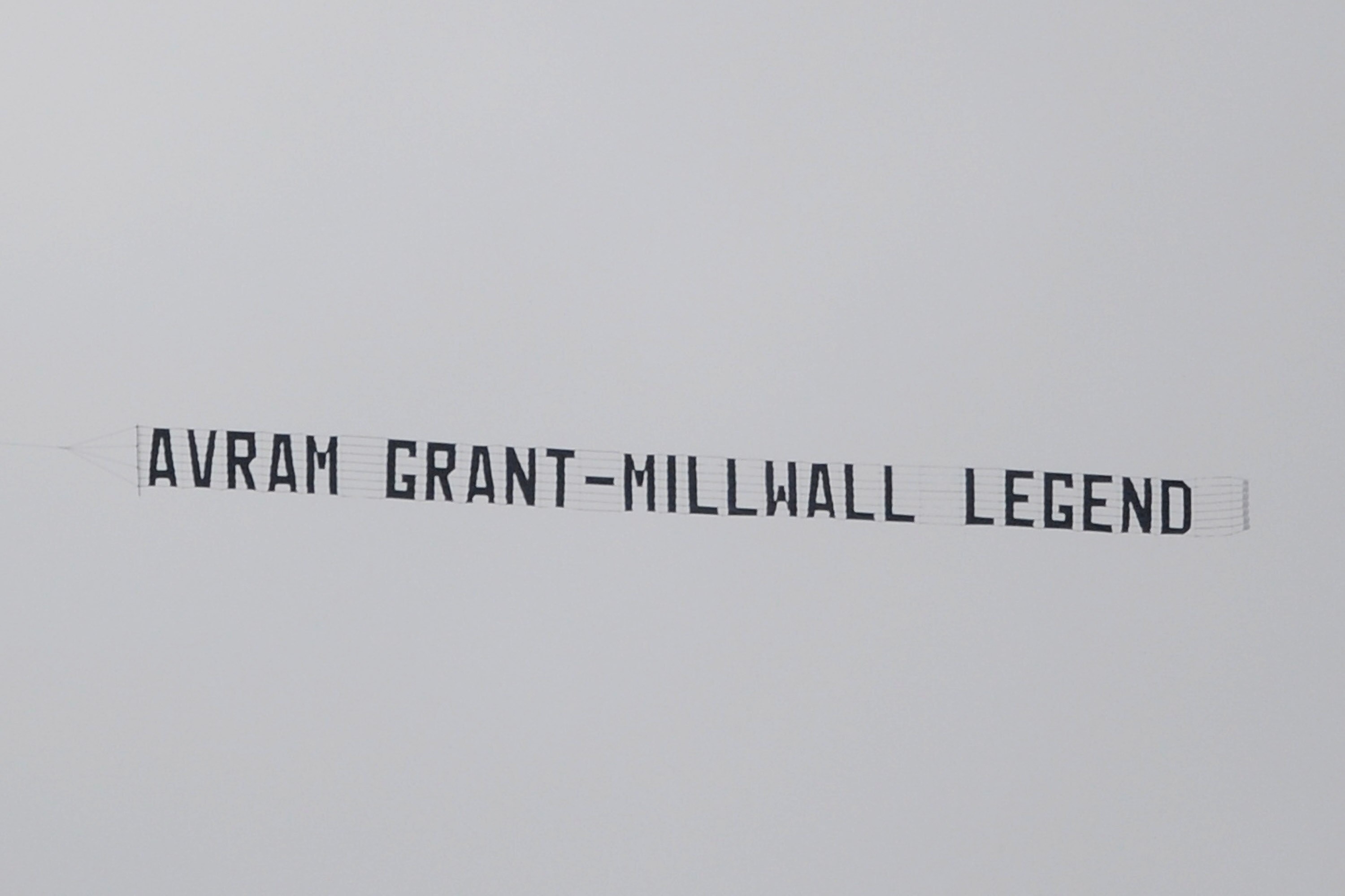 WIGAN, ENGLAND - MAY 15: An aircraft tows a banner above the stadium mocking West Ham Manager Avram Grant during the Barclays Premier League match between Wigan Athletic and West Ham United at the DW Stadium on May 15, 2011 in Wigan, England. (Photo by Ch