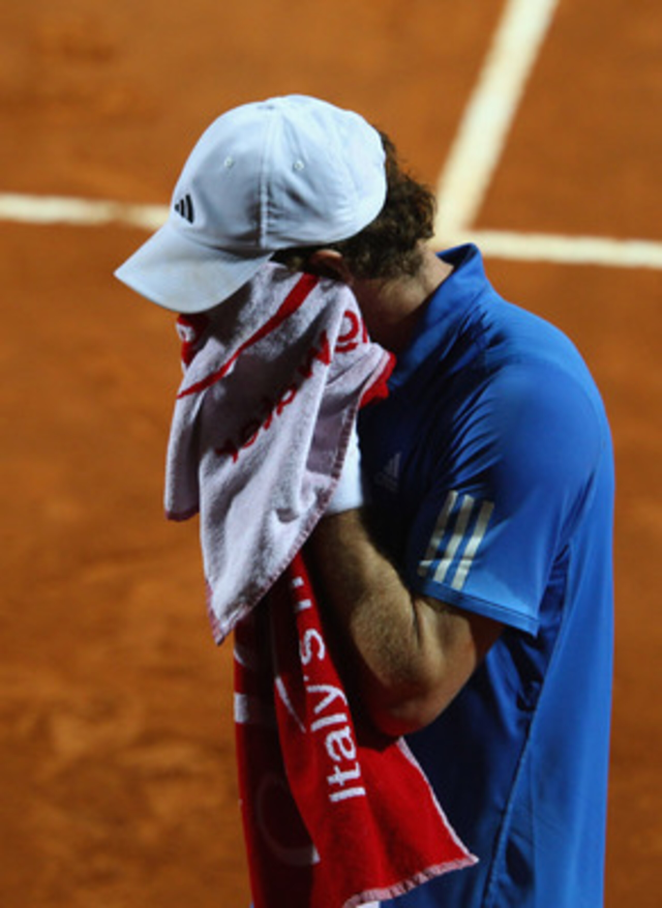 ROME, ITALY - MAY 14:  Andy Murray of Great Britain shows his dejection during his semi final match against Novak Djokovic of Serbia during day seven of the Internazoinali BNL D'Italia at the Foro Italico Tennis Centre  on May 14, 2011 in Rome, Italy.  (P