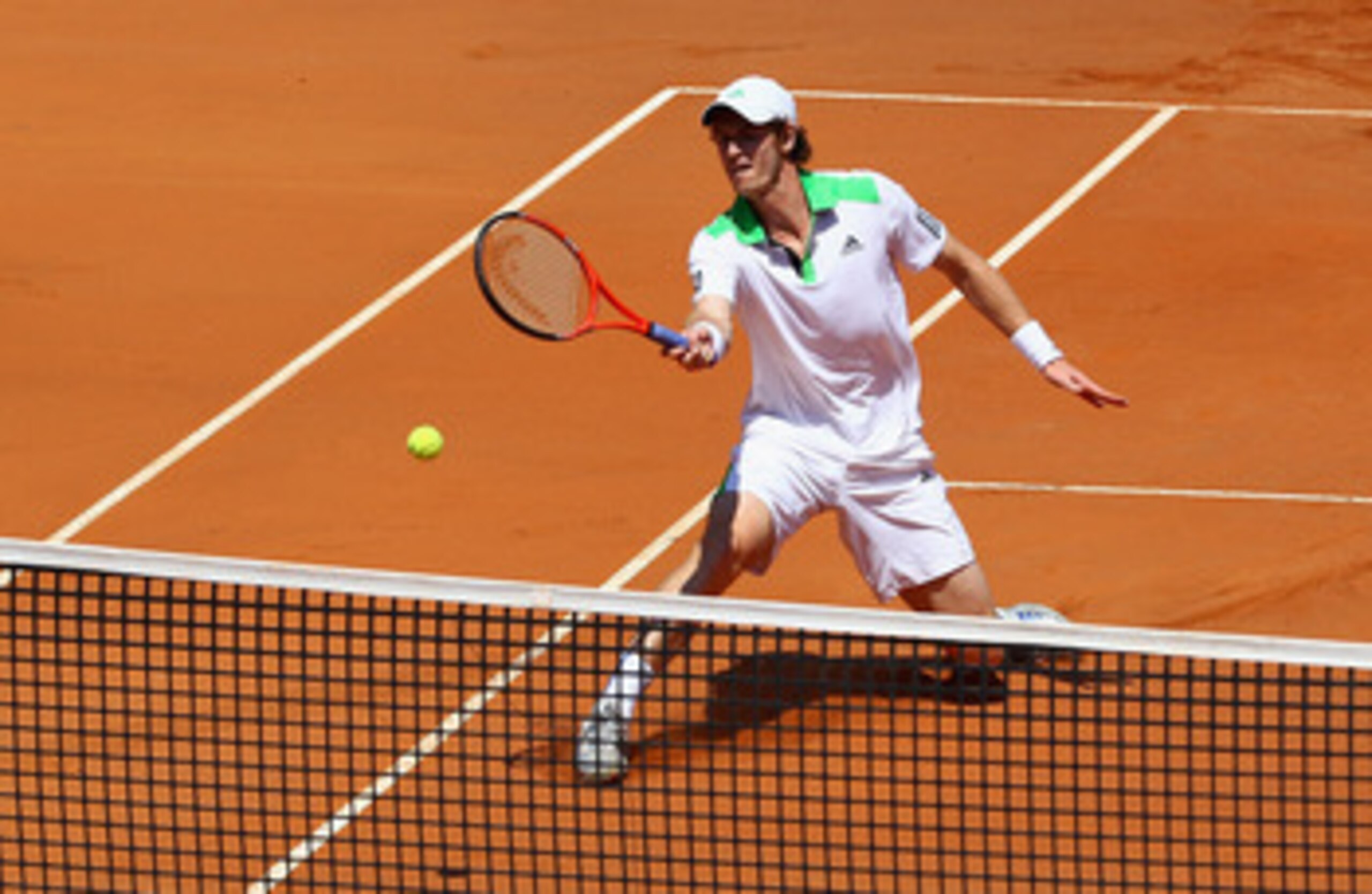 ROME, ITALY - MAY 13:  Andy Murray of Great Britain plays a forehand volley at the net during his quarter final match against Florian Mayer of Germany during day six of the Internazoinali BNL D'Italia at the Foro Italico Tennis Centre  on May 13, 2011 in 
